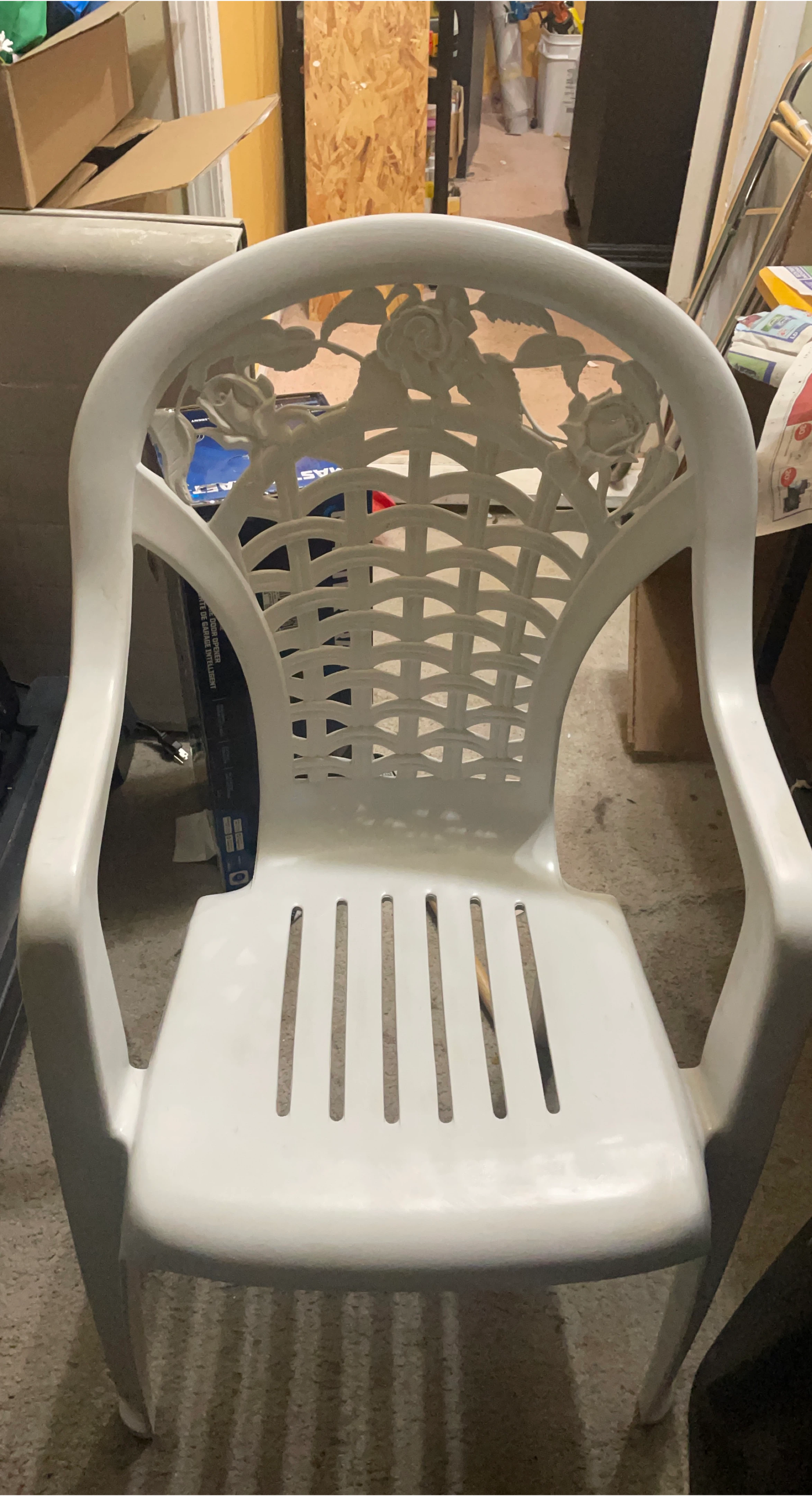 White Plastic Chair with Rose Design