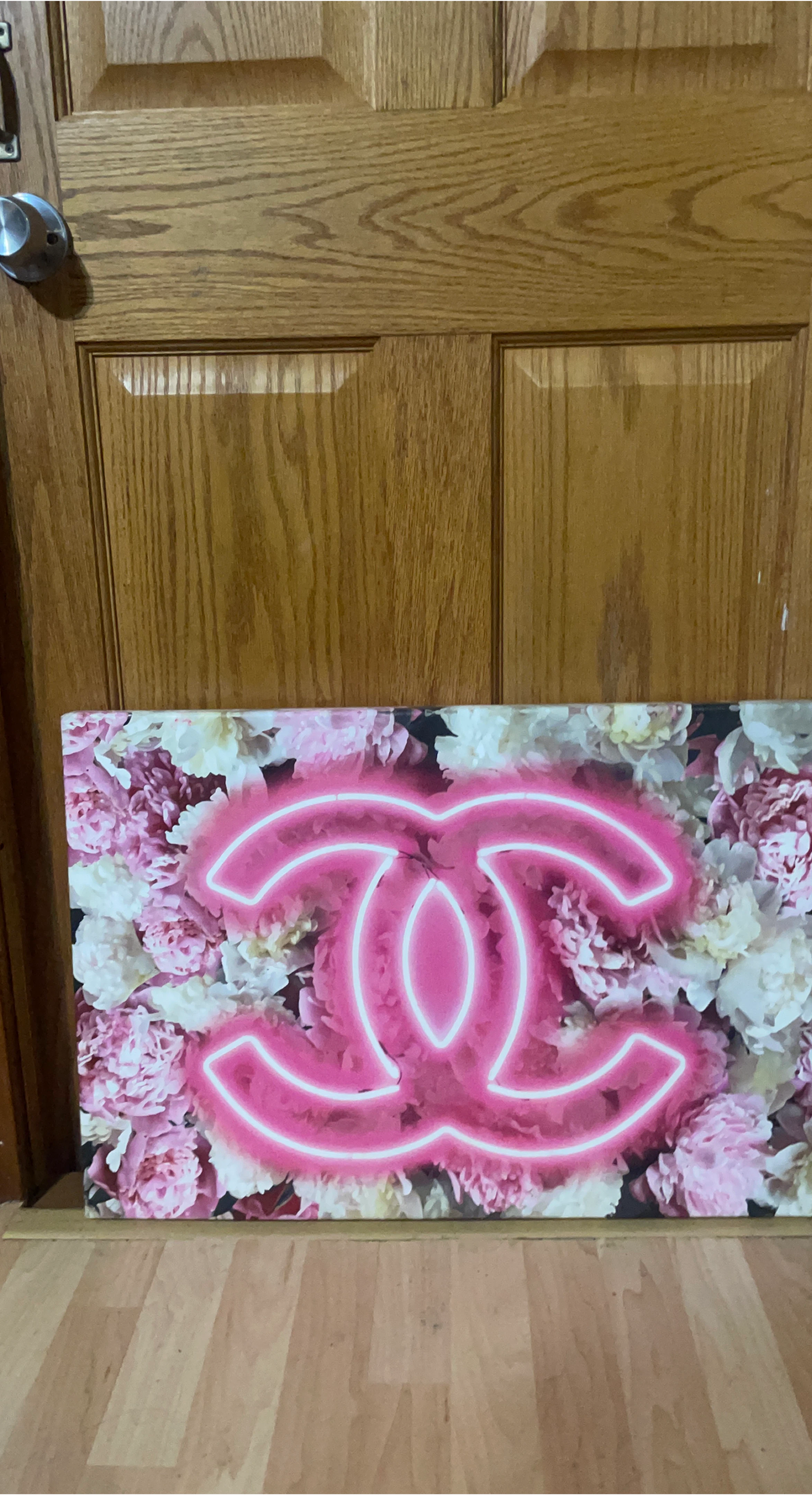 Canvas Wall Art with Pink Neon CC Logo and Flowers