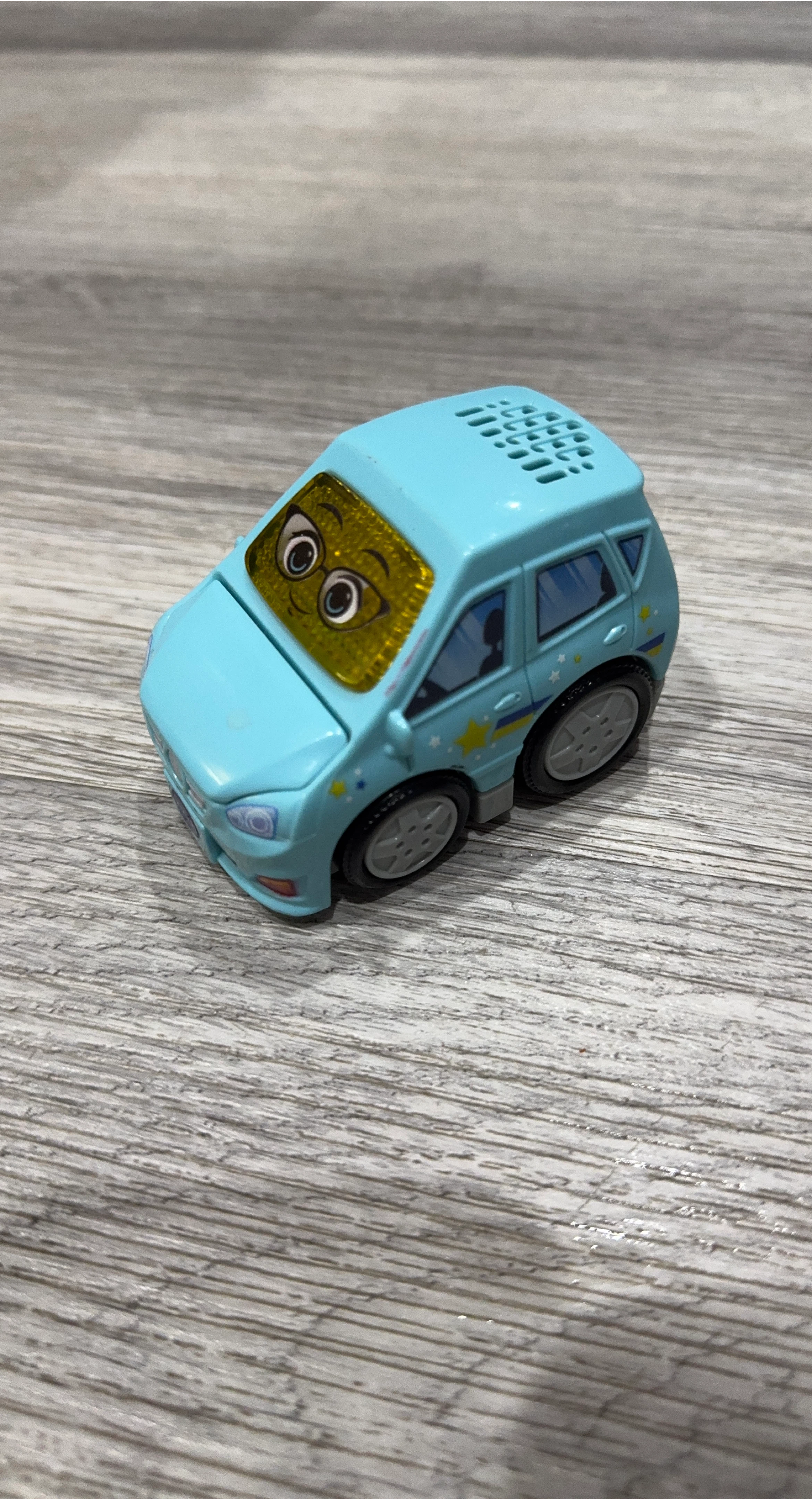 Blue Toy Car with Googly Eyes