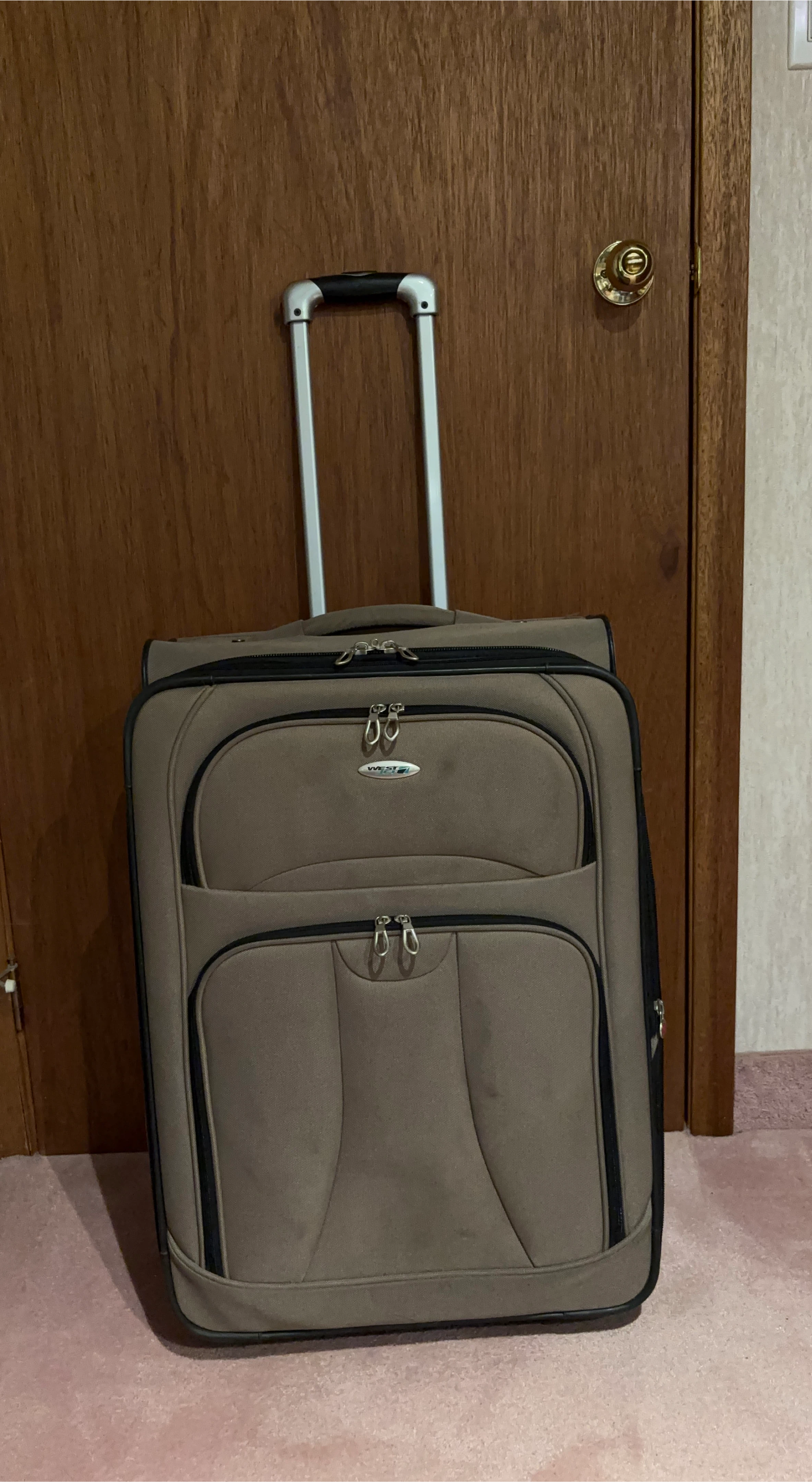 West Jet 26” suitcase.