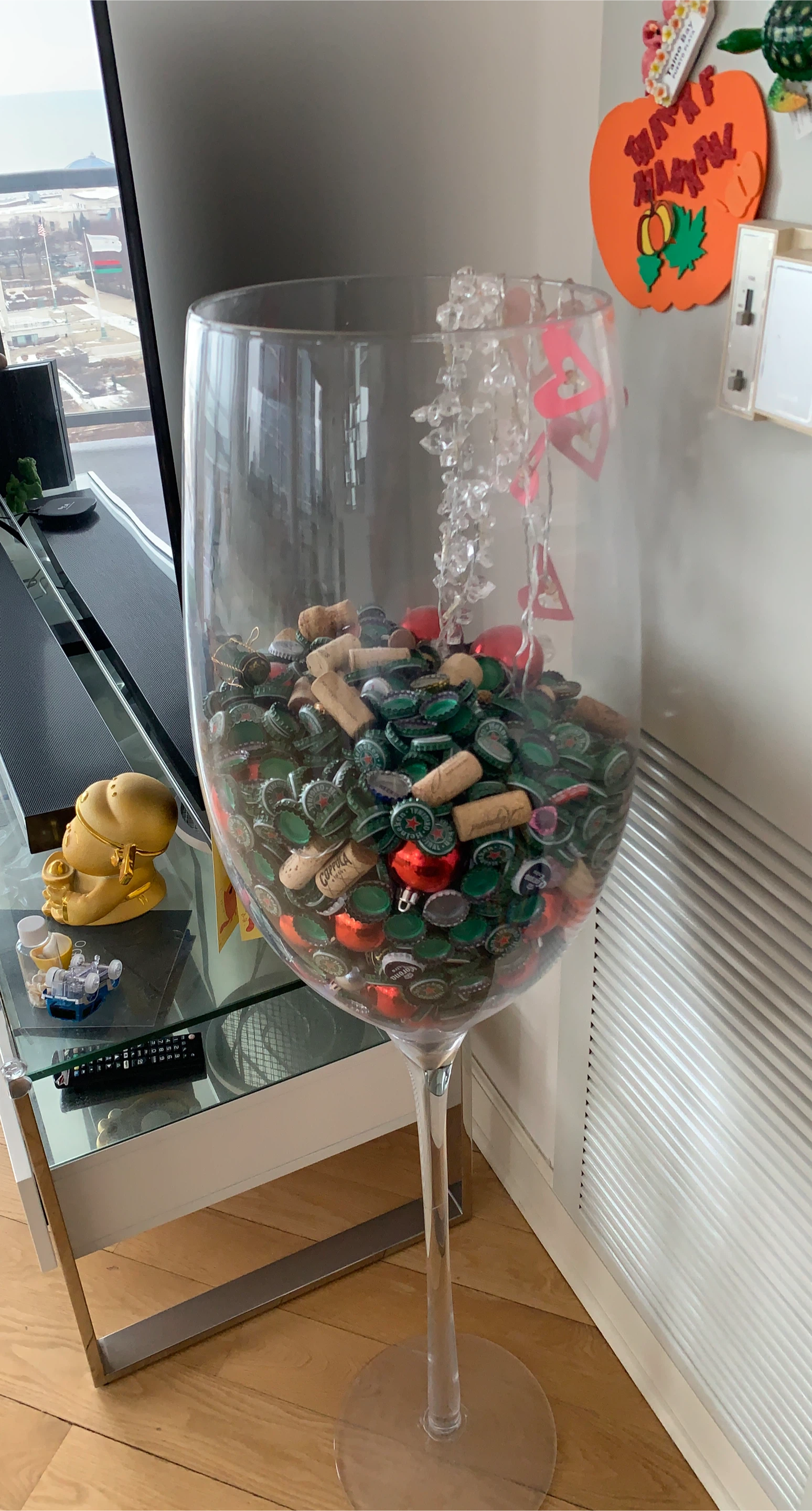 Giant Wine Glass Filled with Bottle Caps and Corks