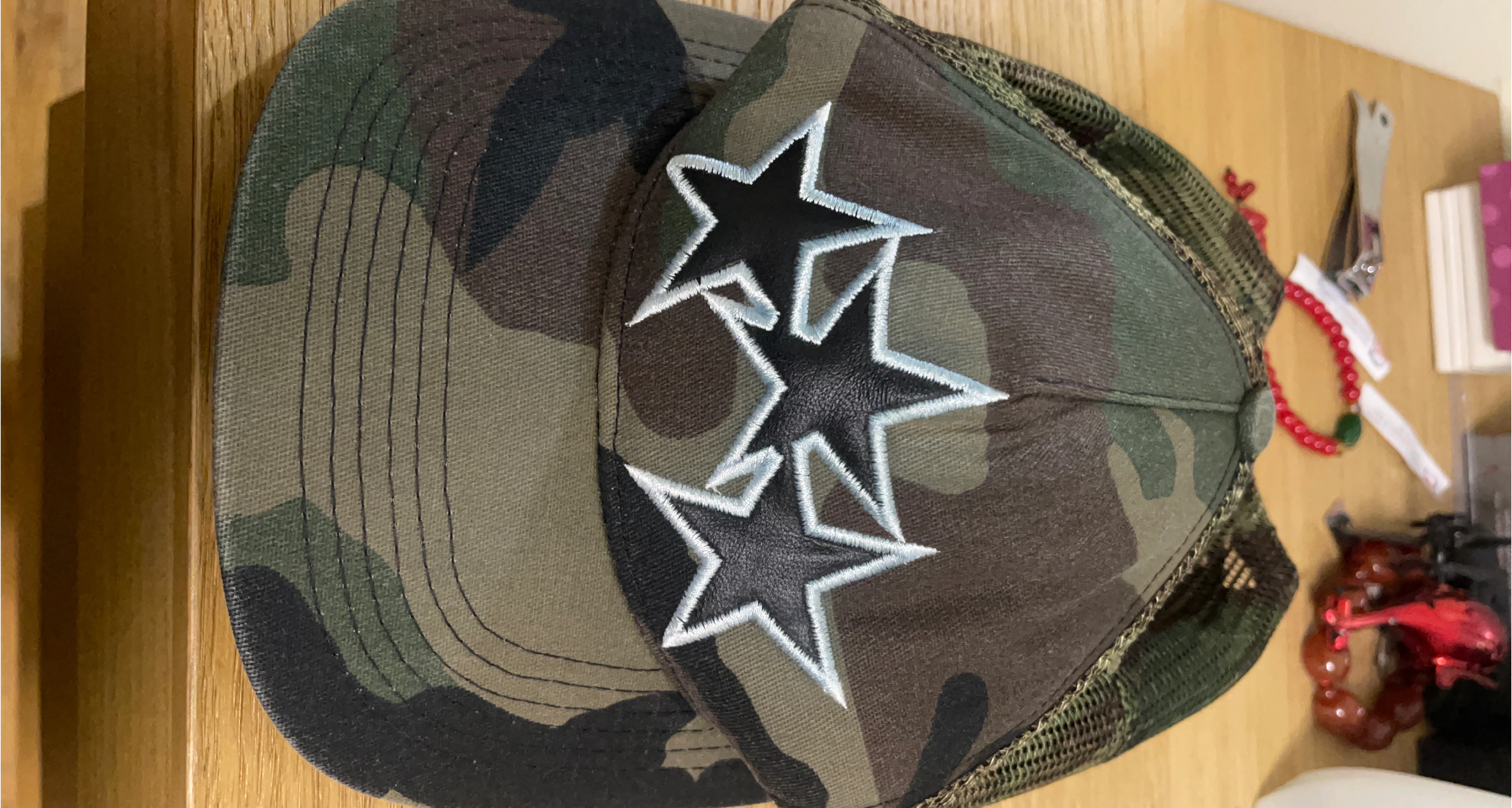 Amiri Camouflage Trucker Hat with Stars