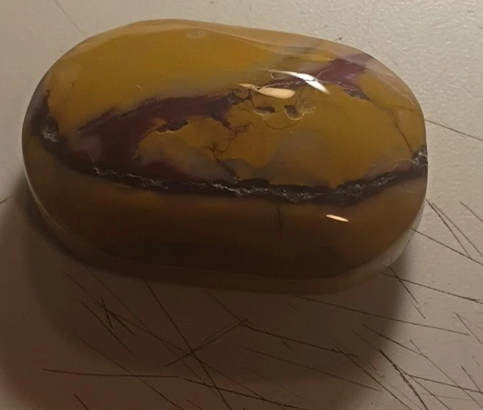 Polished Yellow and Purple Stone