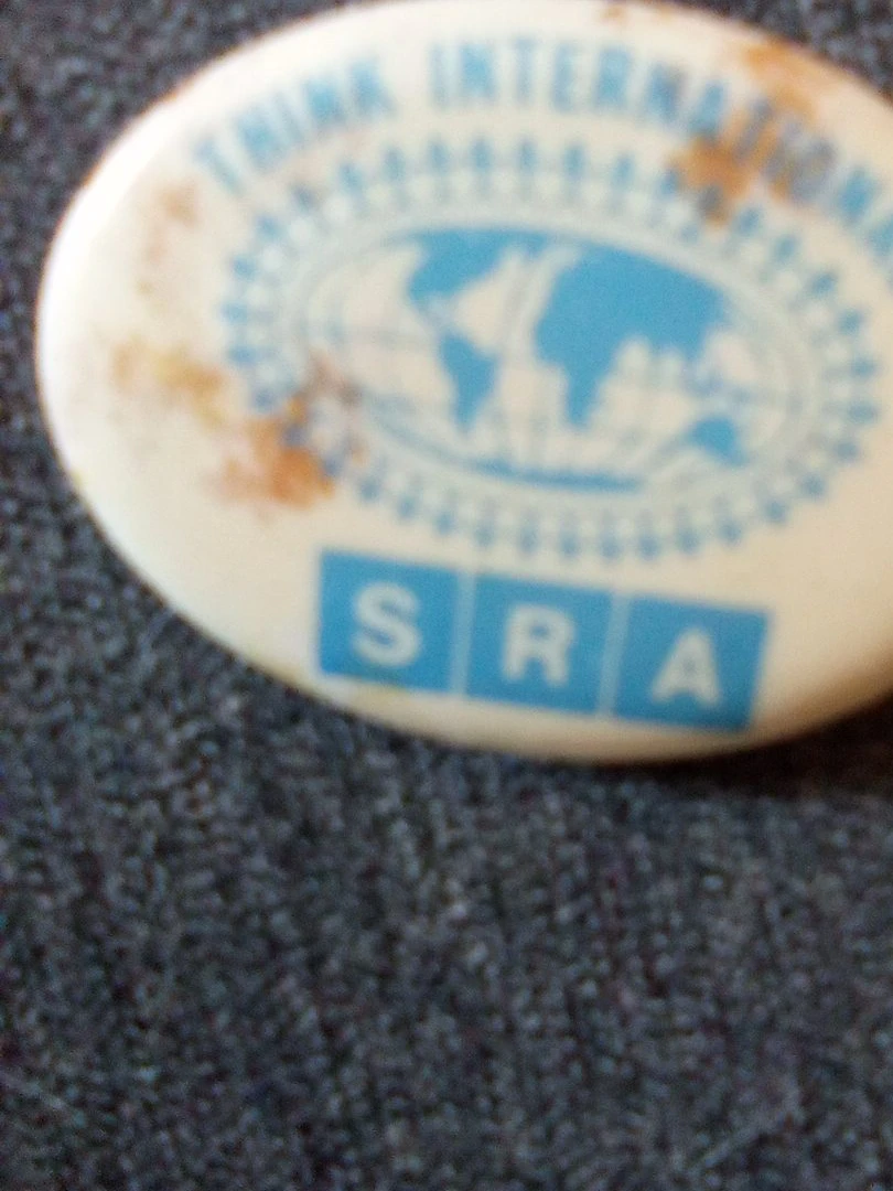 THINK INTERNATIONAL SRA Pin