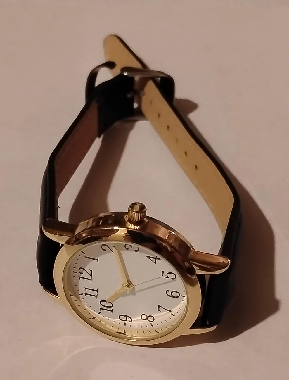 Gold Tone Ladies Watch with Black Band