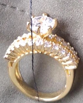 Gold engagement ring with cubic zirconia