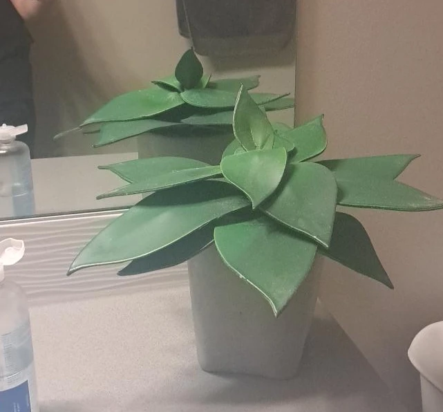 Artificial Green Plant in White Pot