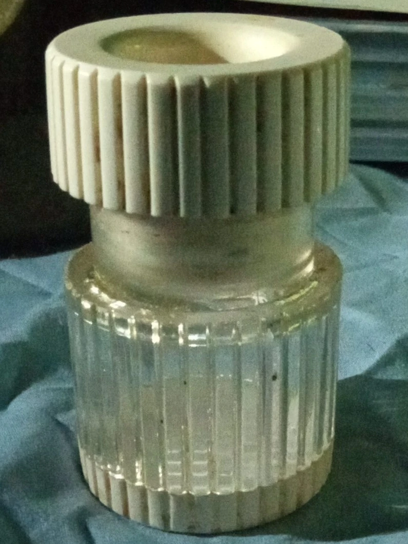 Glass and White Container