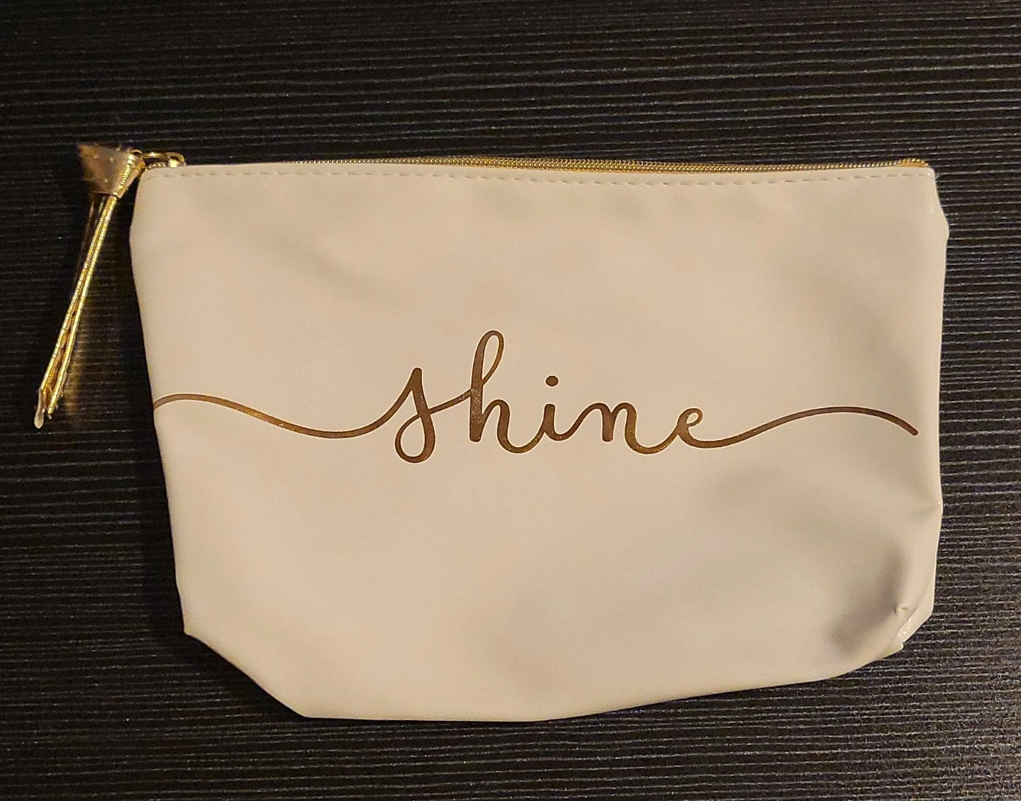 White Cosmetic Bag with "shine" text