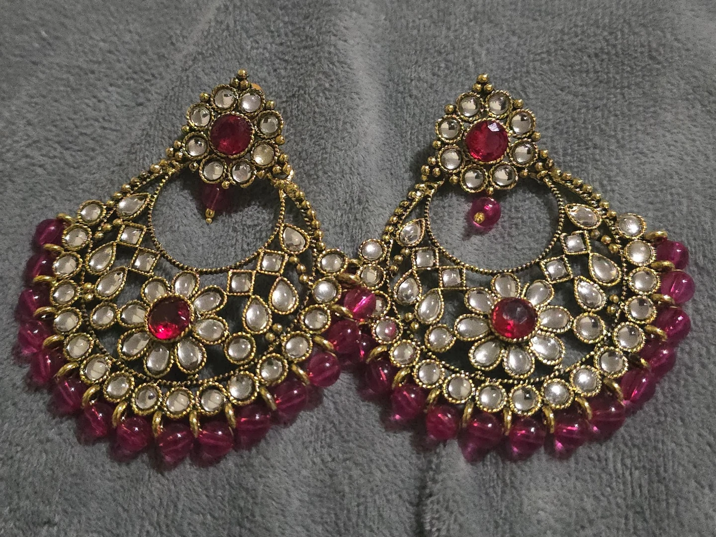 Ornate Gold-Tone Chandelier Earrings with Red and Clear Jewels