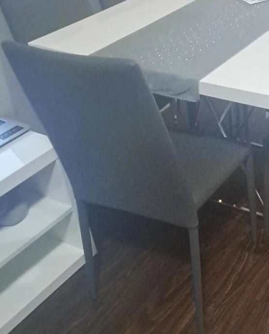 Grey upholstered dining chair