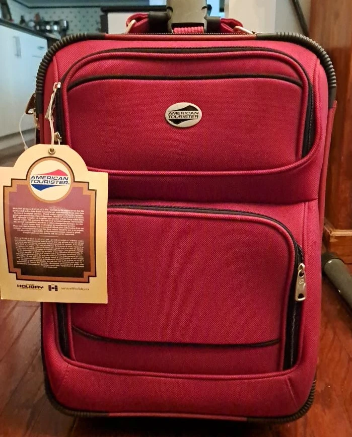 American Tourister Red Spinner Luggage