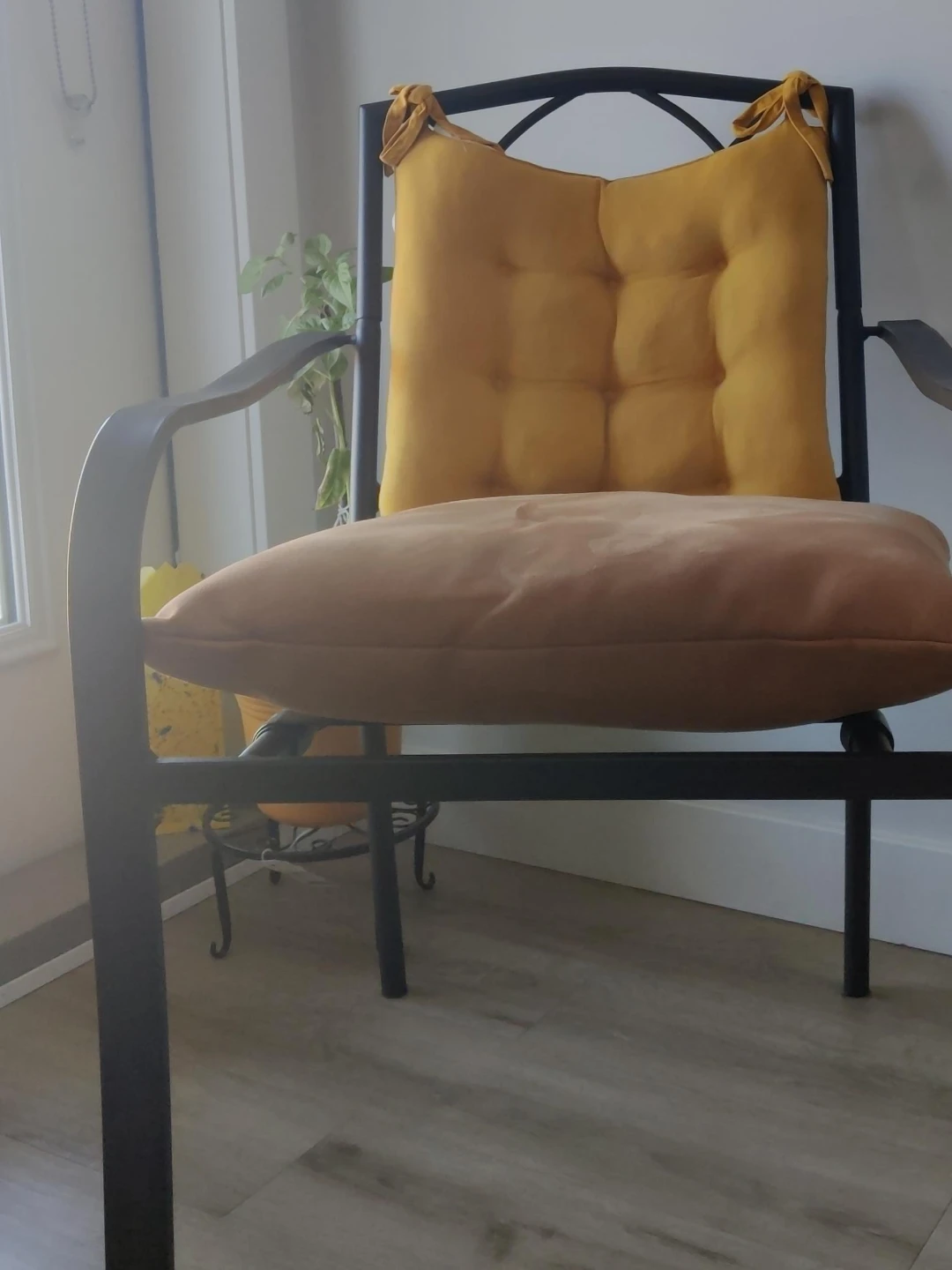Metal patio chair with cushions