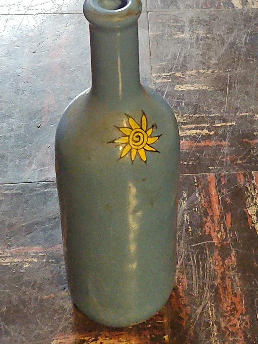 Decorative Bottle with Sun Design