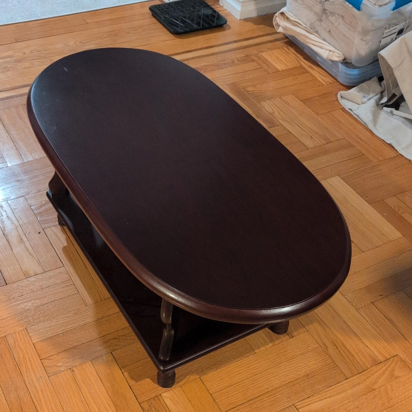 Dark Wood Oval Coffee Table with Shelf