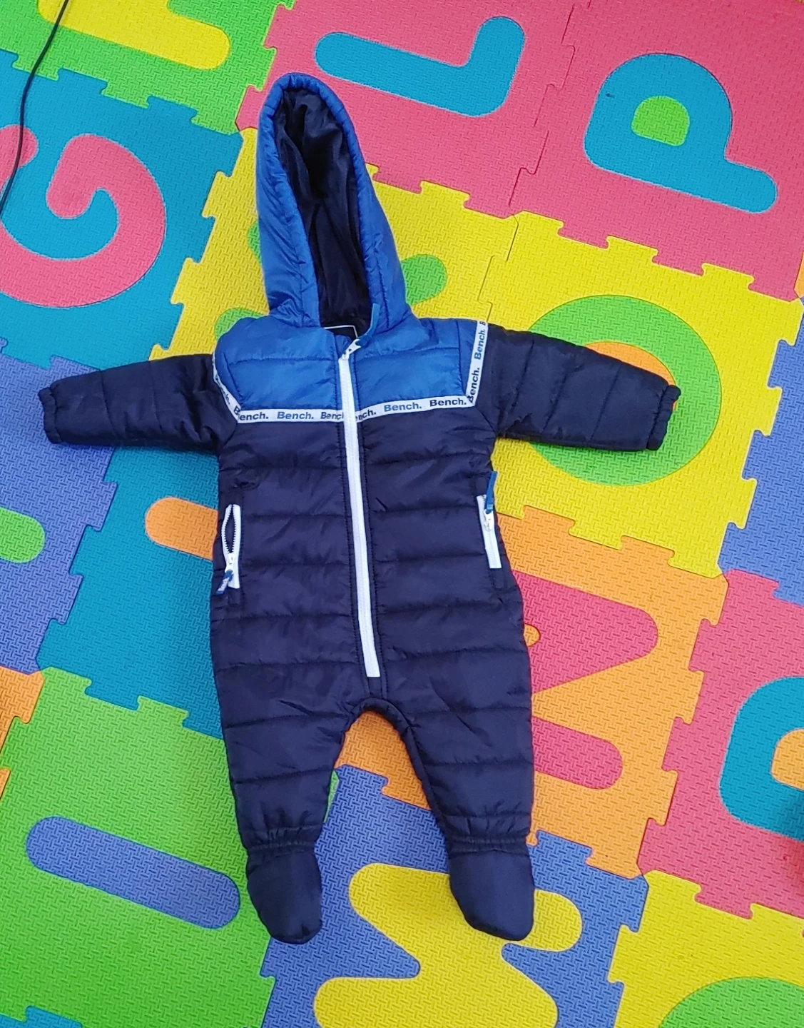 Bench. Baby Snowsuit