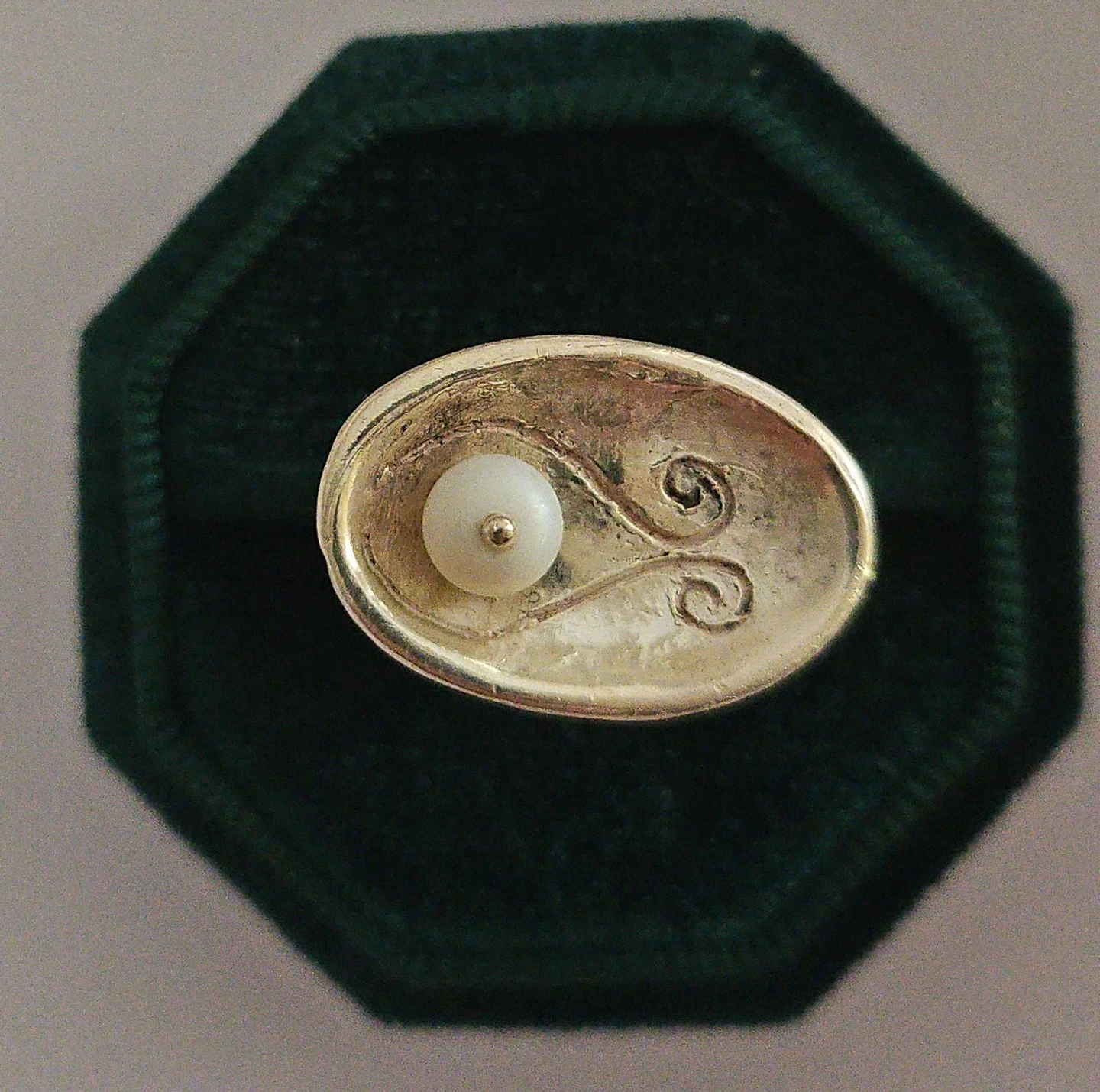 Silver Ring with Embedded Pearl