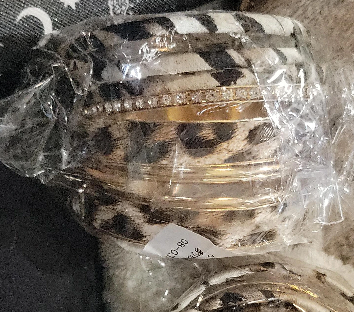 2 set's of 5 leopard print and gold bangles with rhinestones