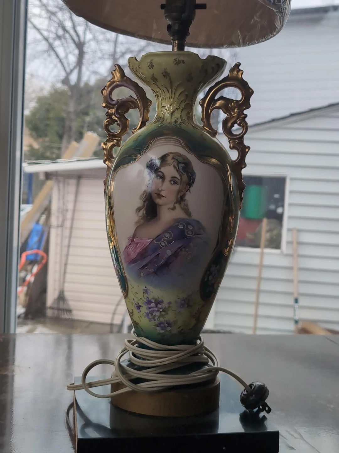A vintage table lamp from the 19th to 20th century