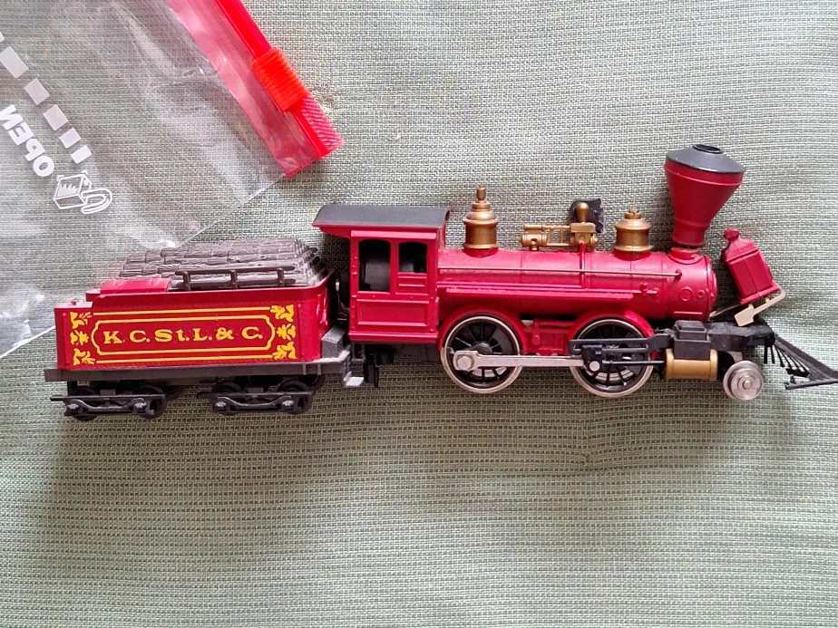 Red Toy Train with "K.C. St. L. & C." Coal Car