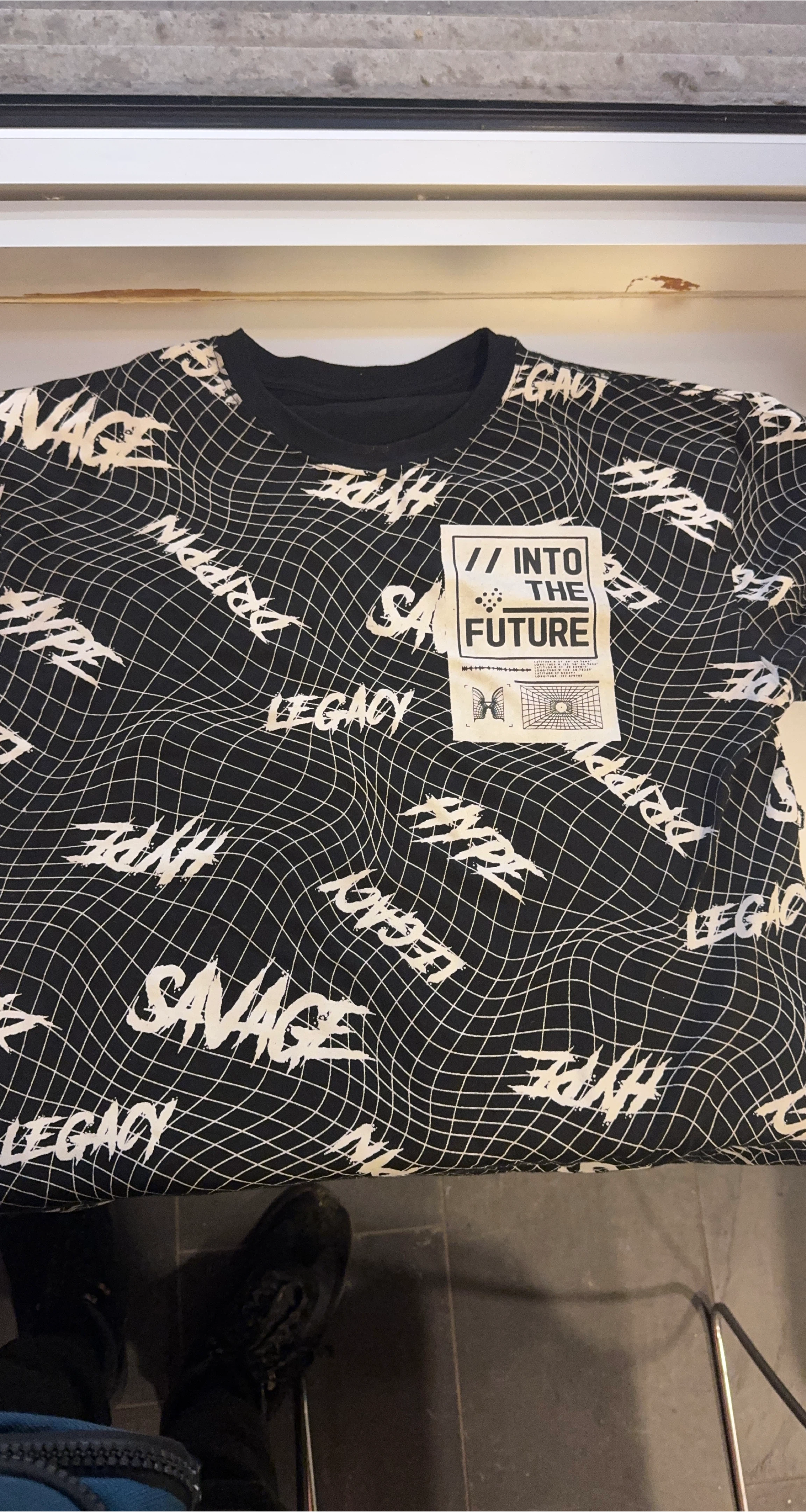 Black T-Shirt with "Into the Future" Graphic