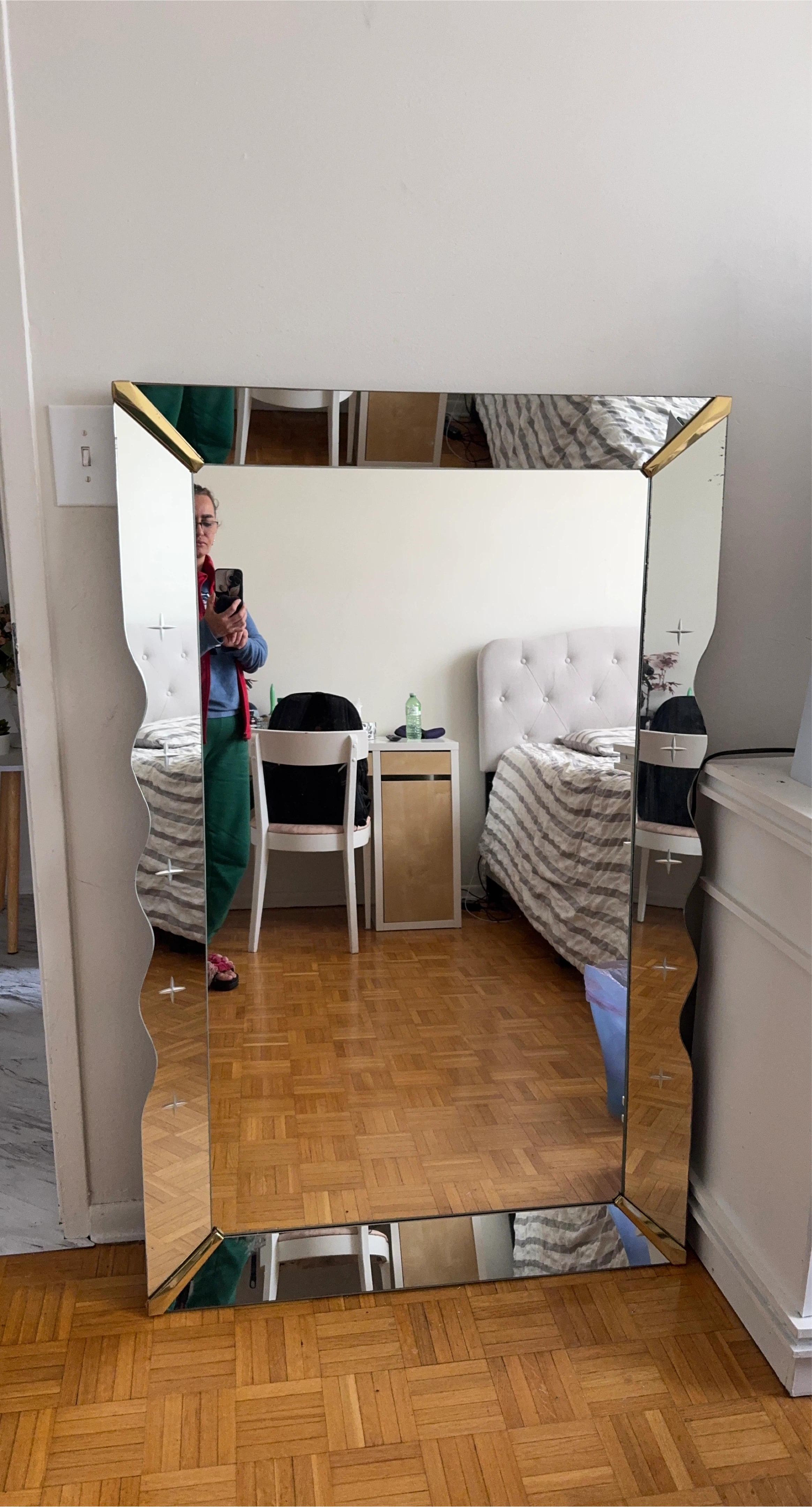 Large decorative mirror with gold trim