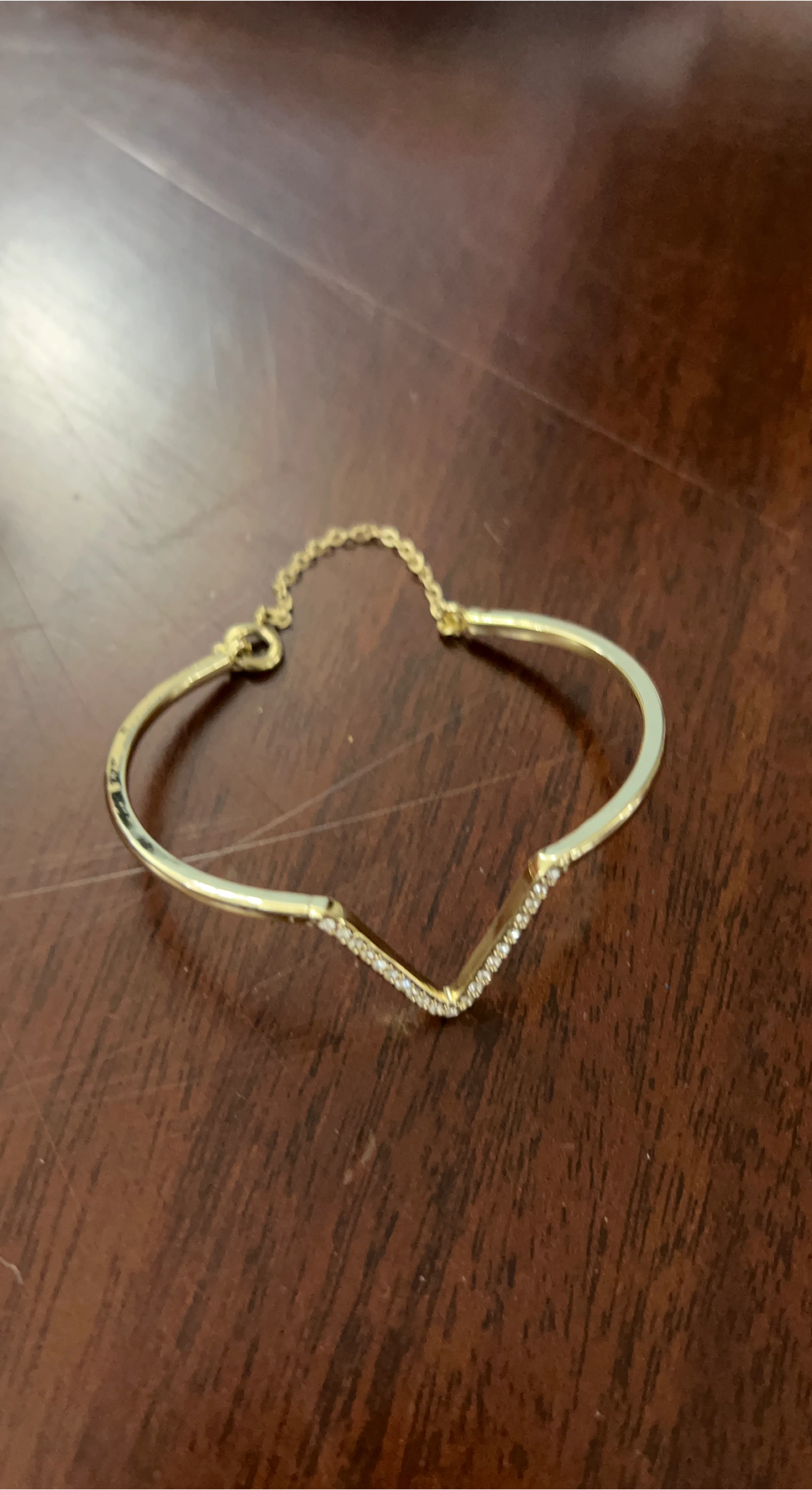 Gold tone cuff bracelet with crystals