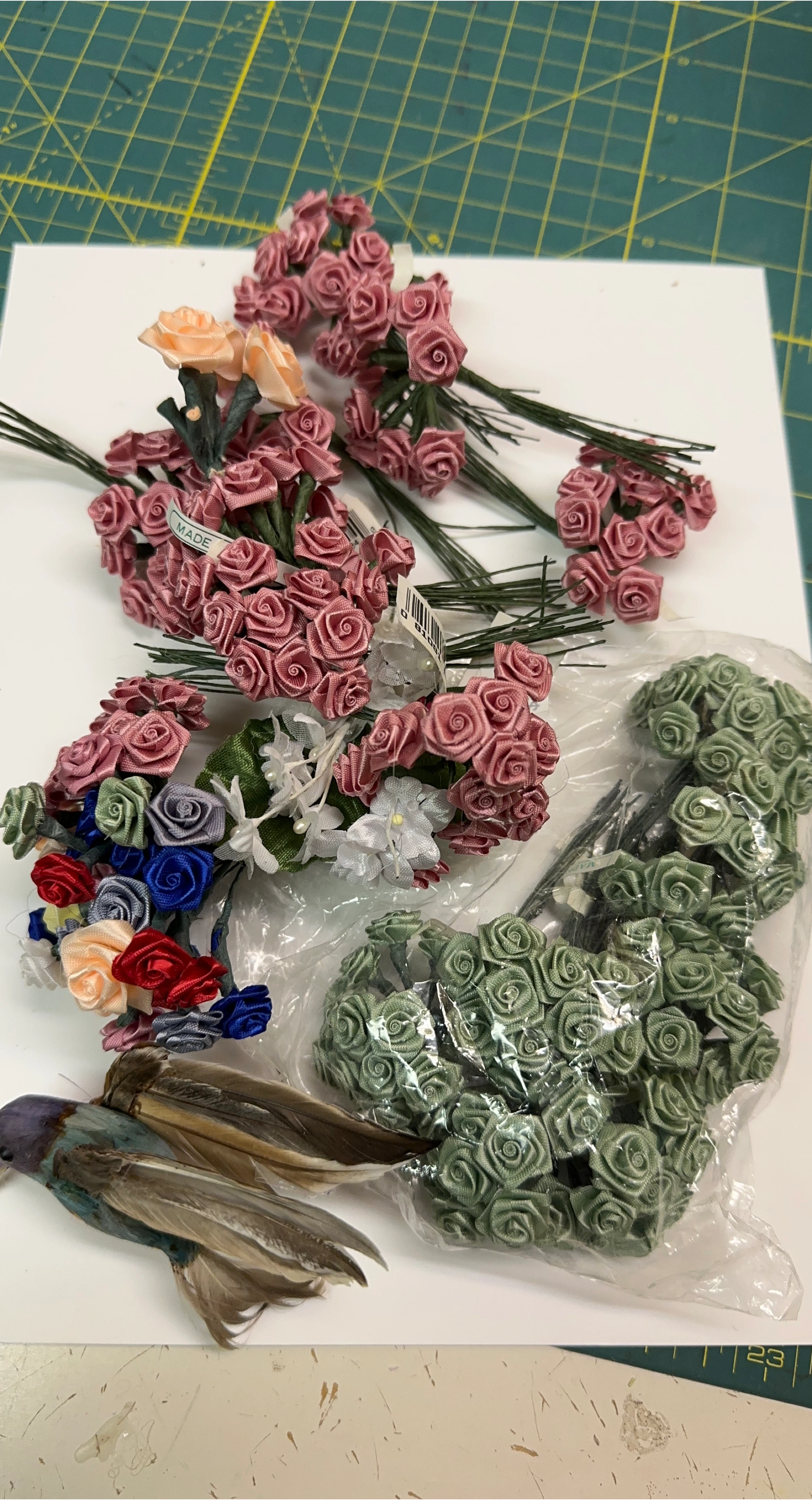 Lot of ribbon roses and craft bird