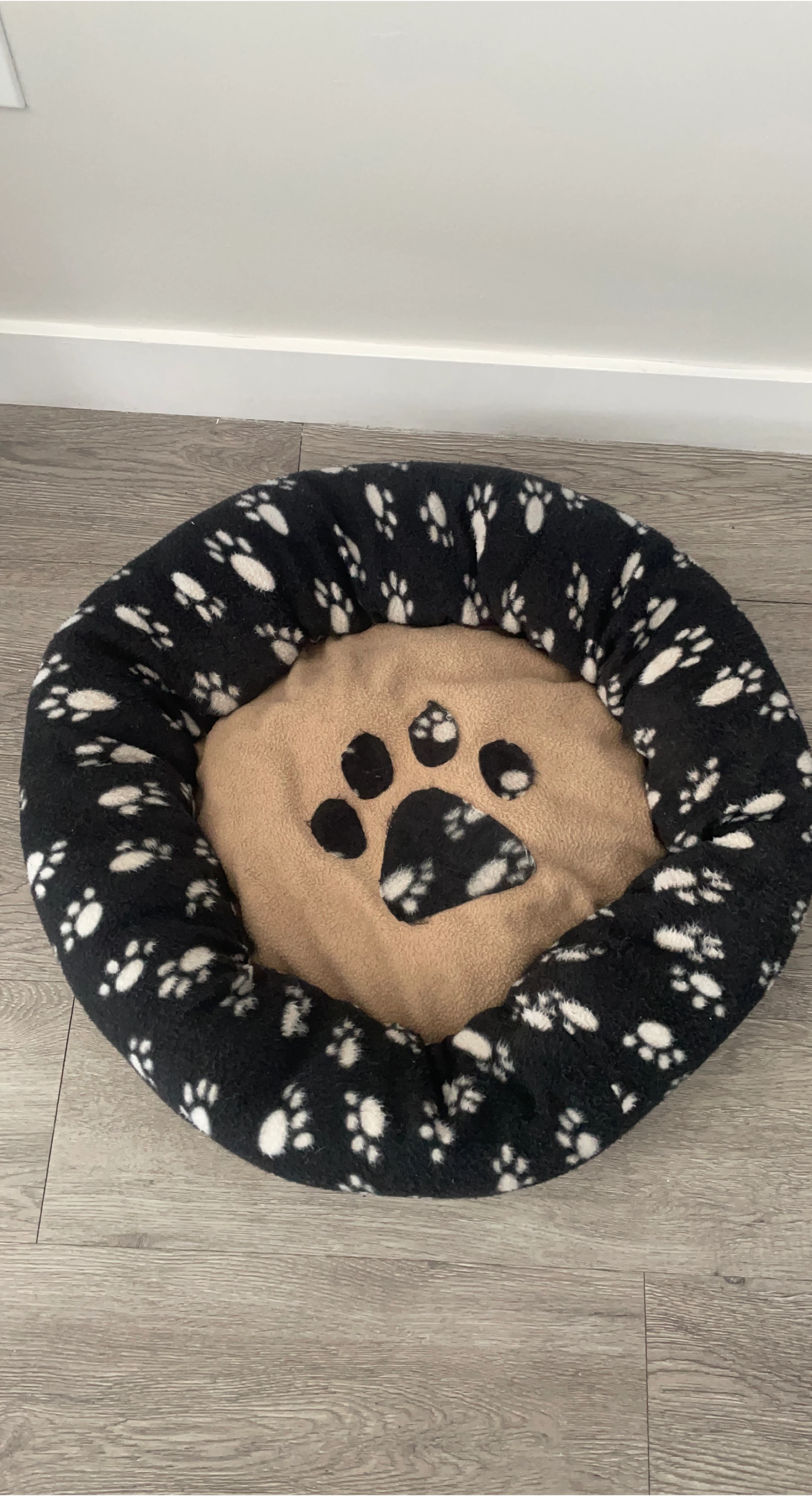 Round Pet Bed with Paw Print Design