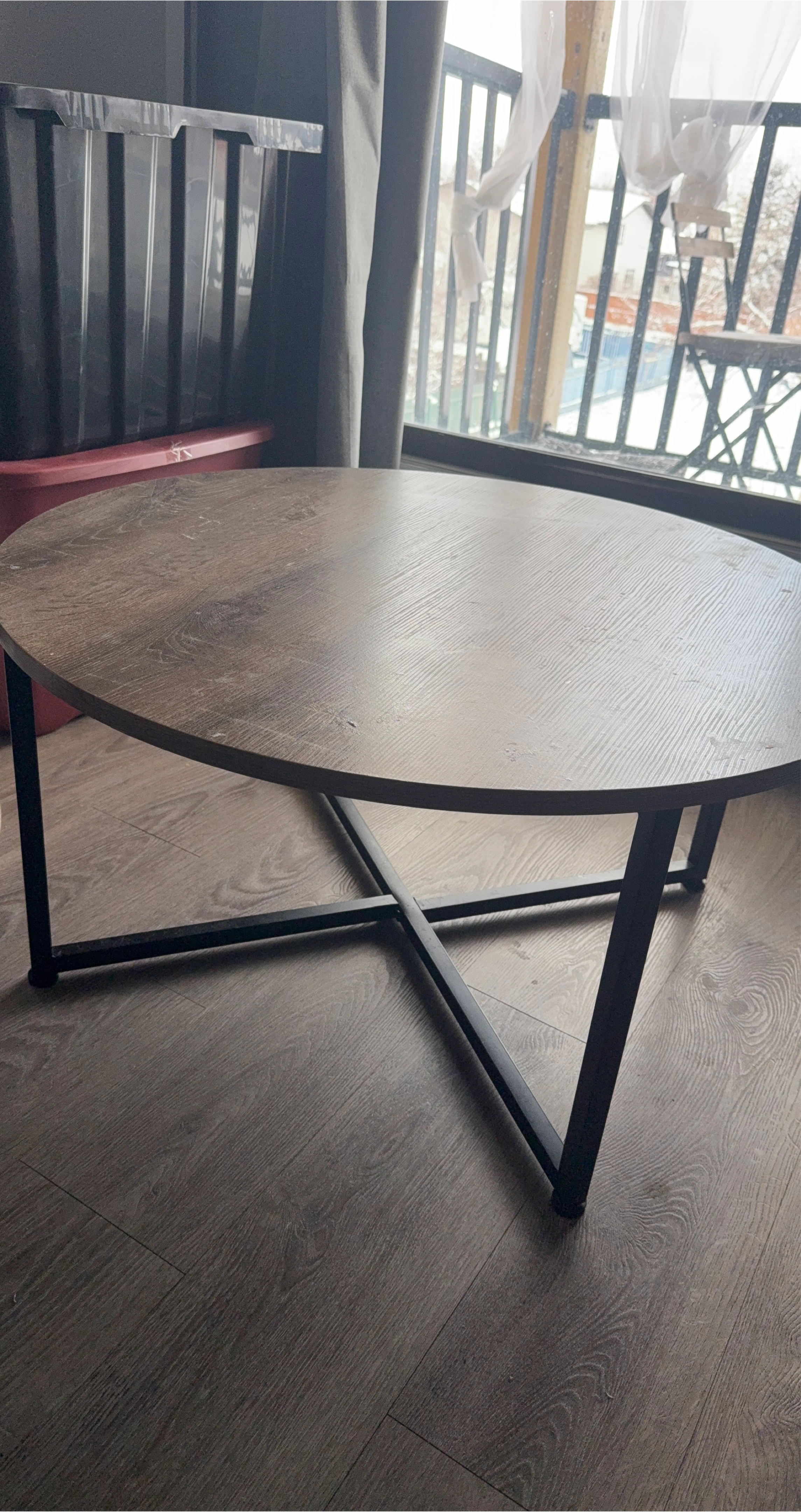 Round Coffee Table with Wood-Look Top and Black Metal Base