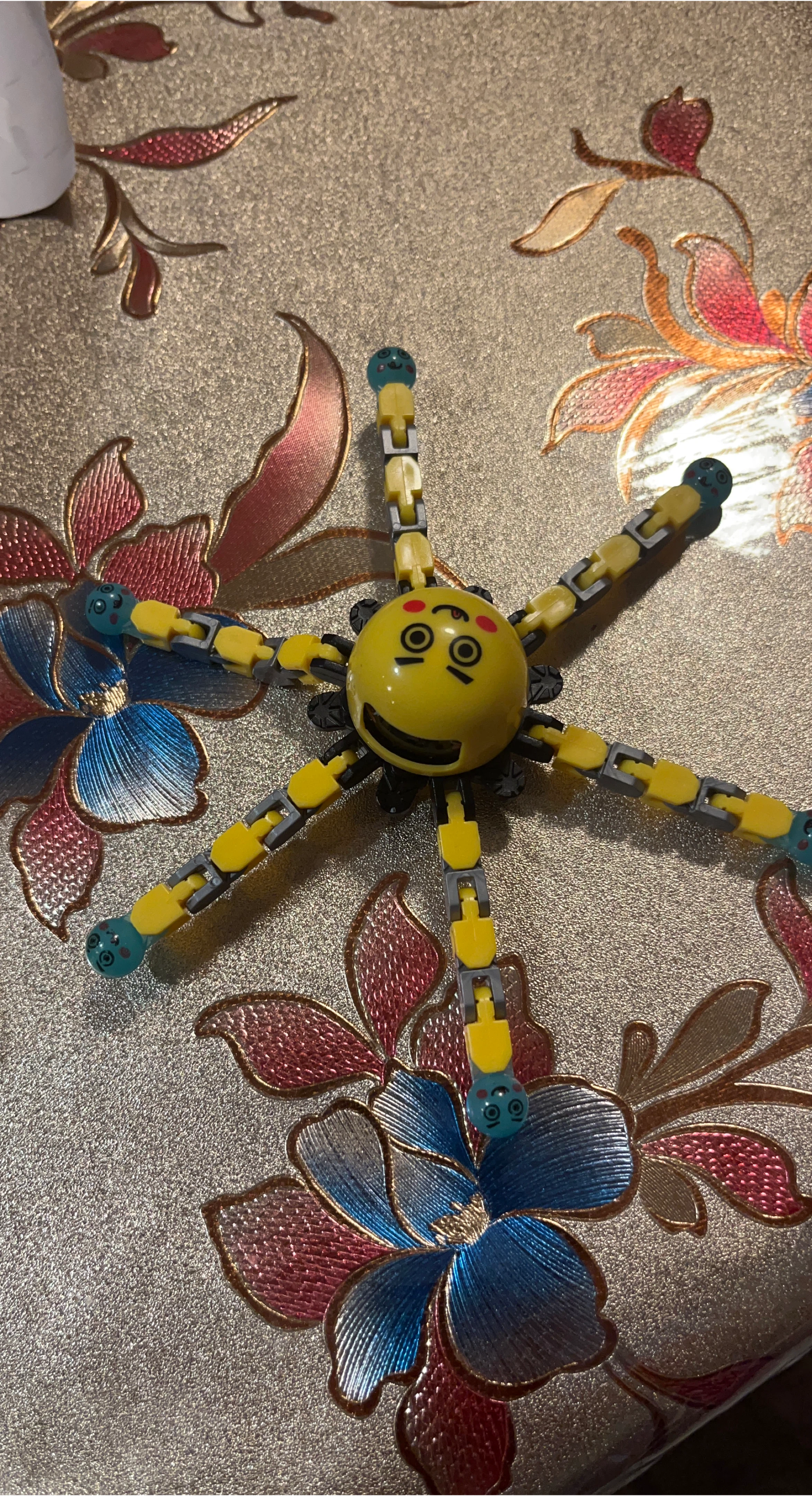 Yellow Articulated Octopus Toy with Smiling Face
