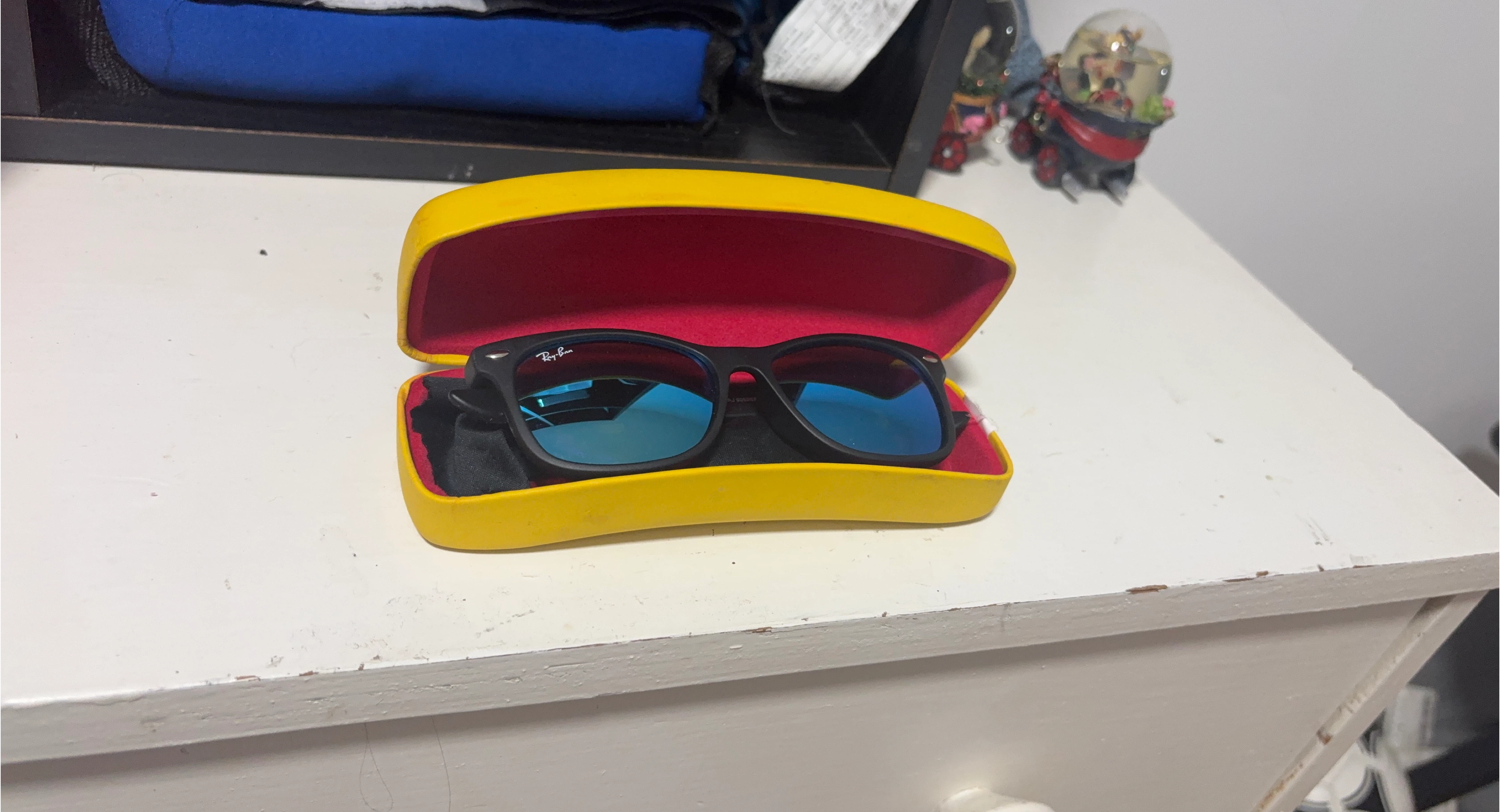 Ray-Ban Sunglasses with Blue Lenses and Yellow Case