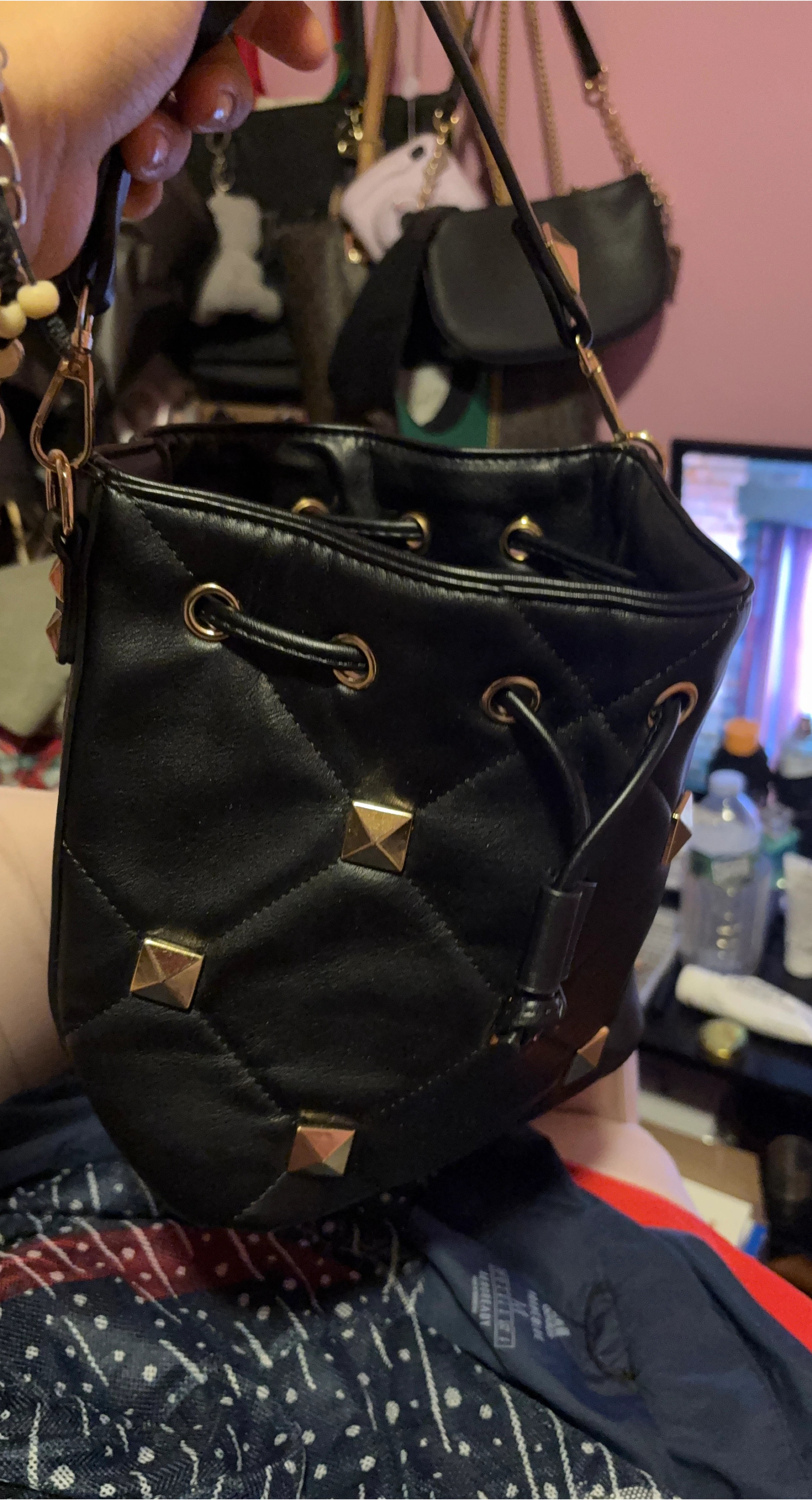 Black Quilted Bucket Bag with Gold Studs