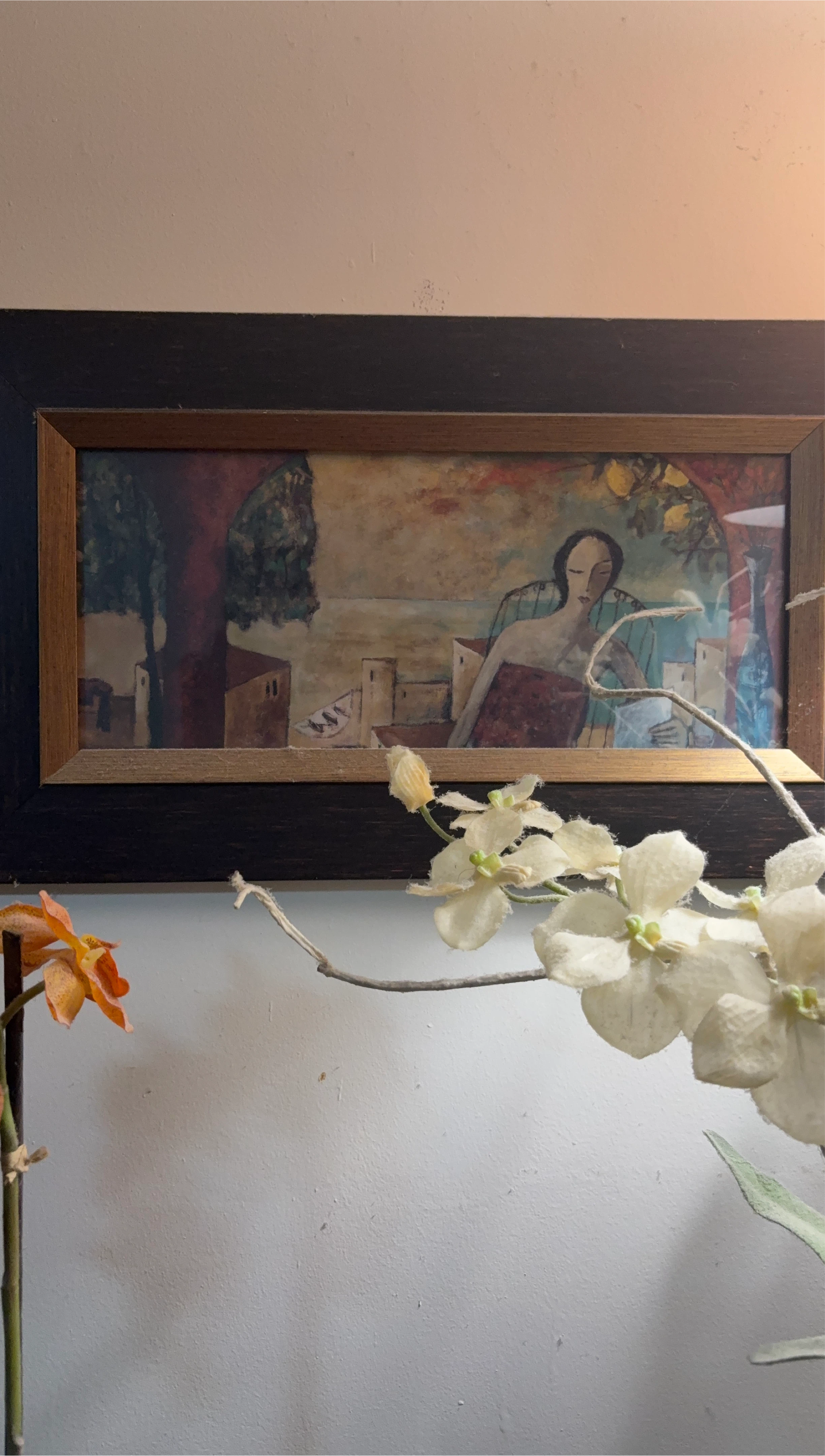 Framed Art Print with Woman and Mediterranean Village Scene