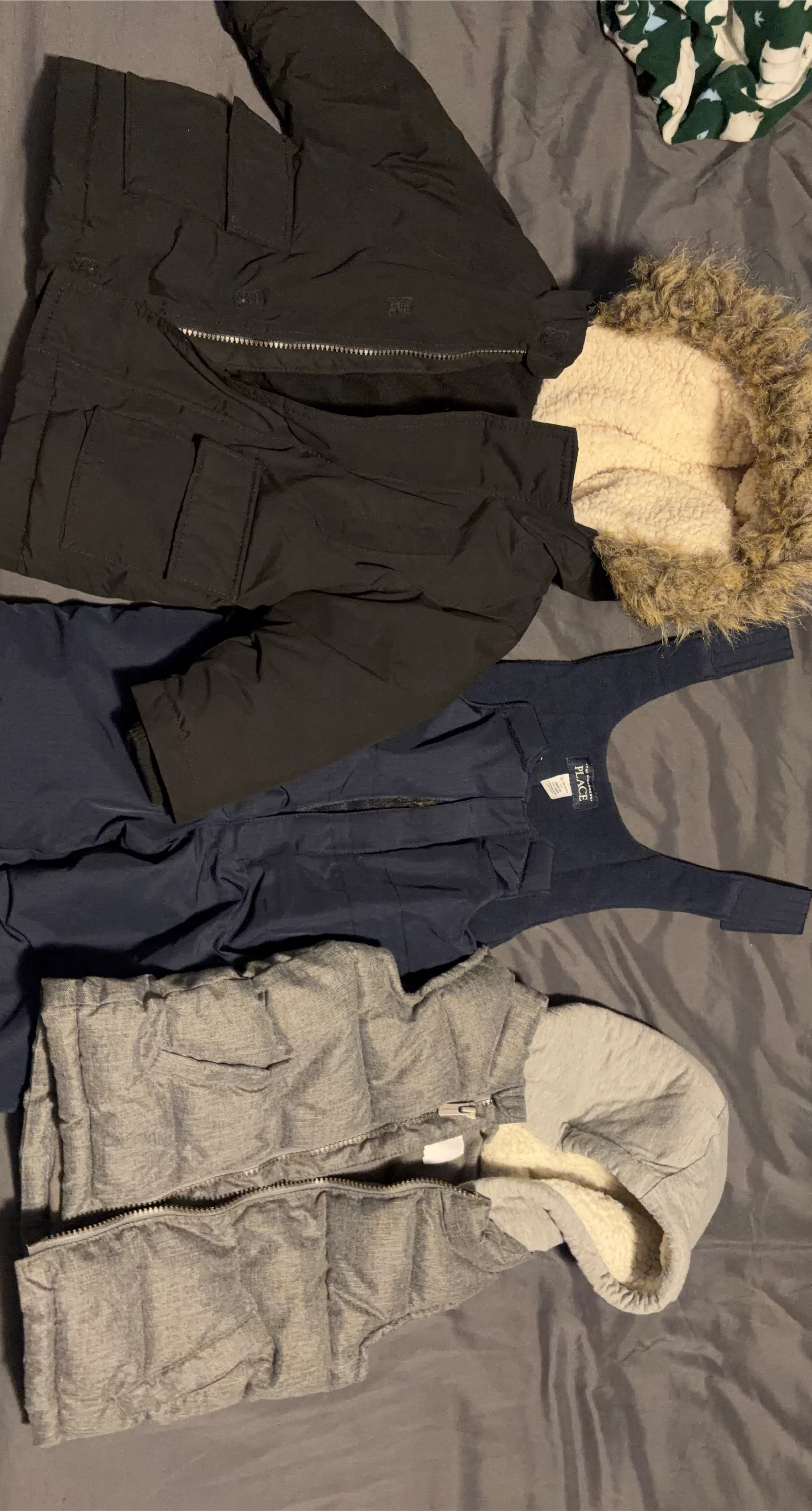 winter jacket, puffer vest and snow pants