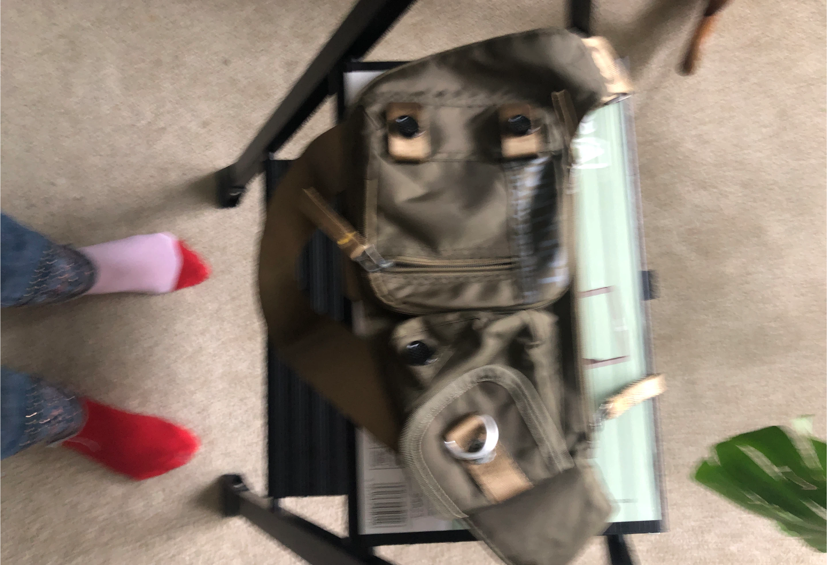 Olive green shoulder pack