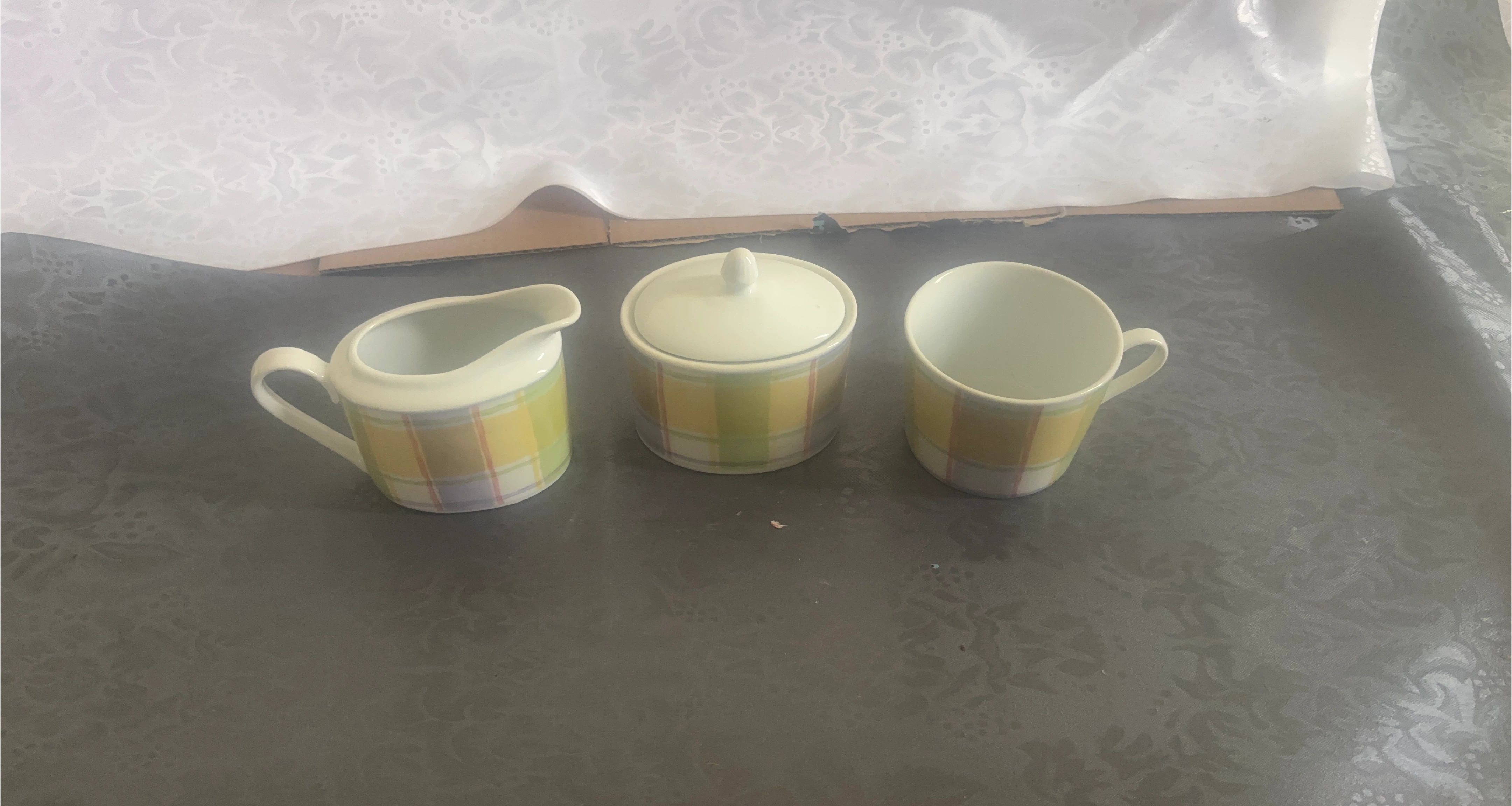 Creamer, Sugar Bowl, and Cup Set