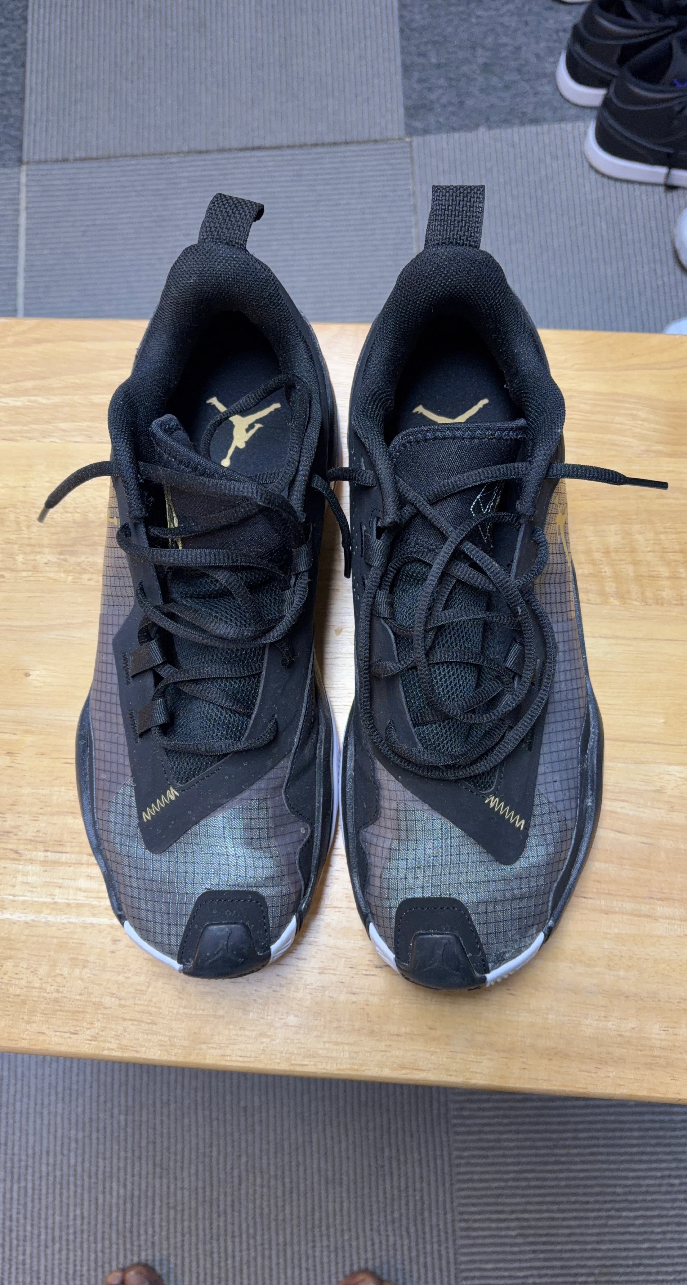 Nike Air Jordan Black and Gold Sneakers