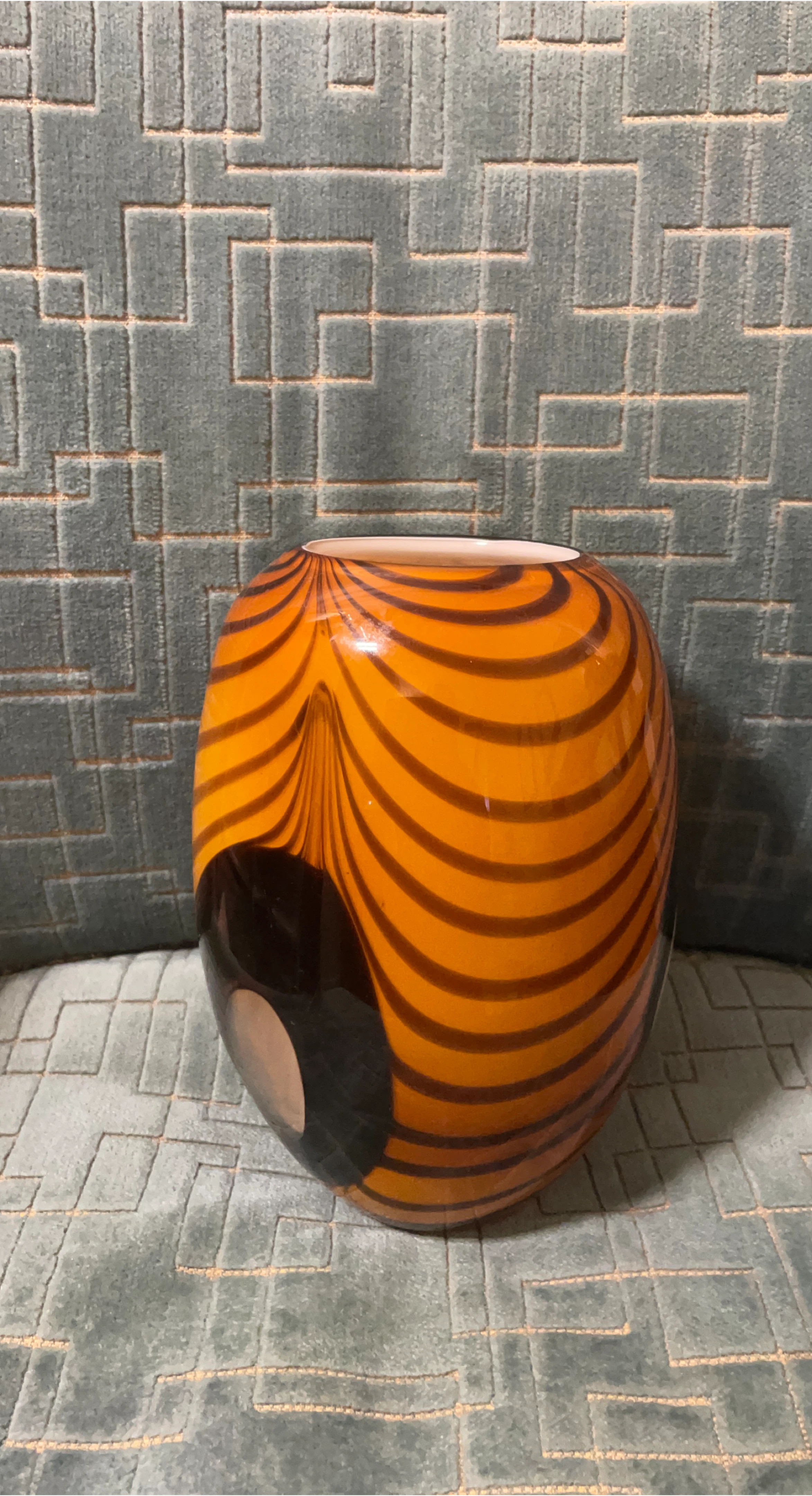 Orange and black striped glass vase