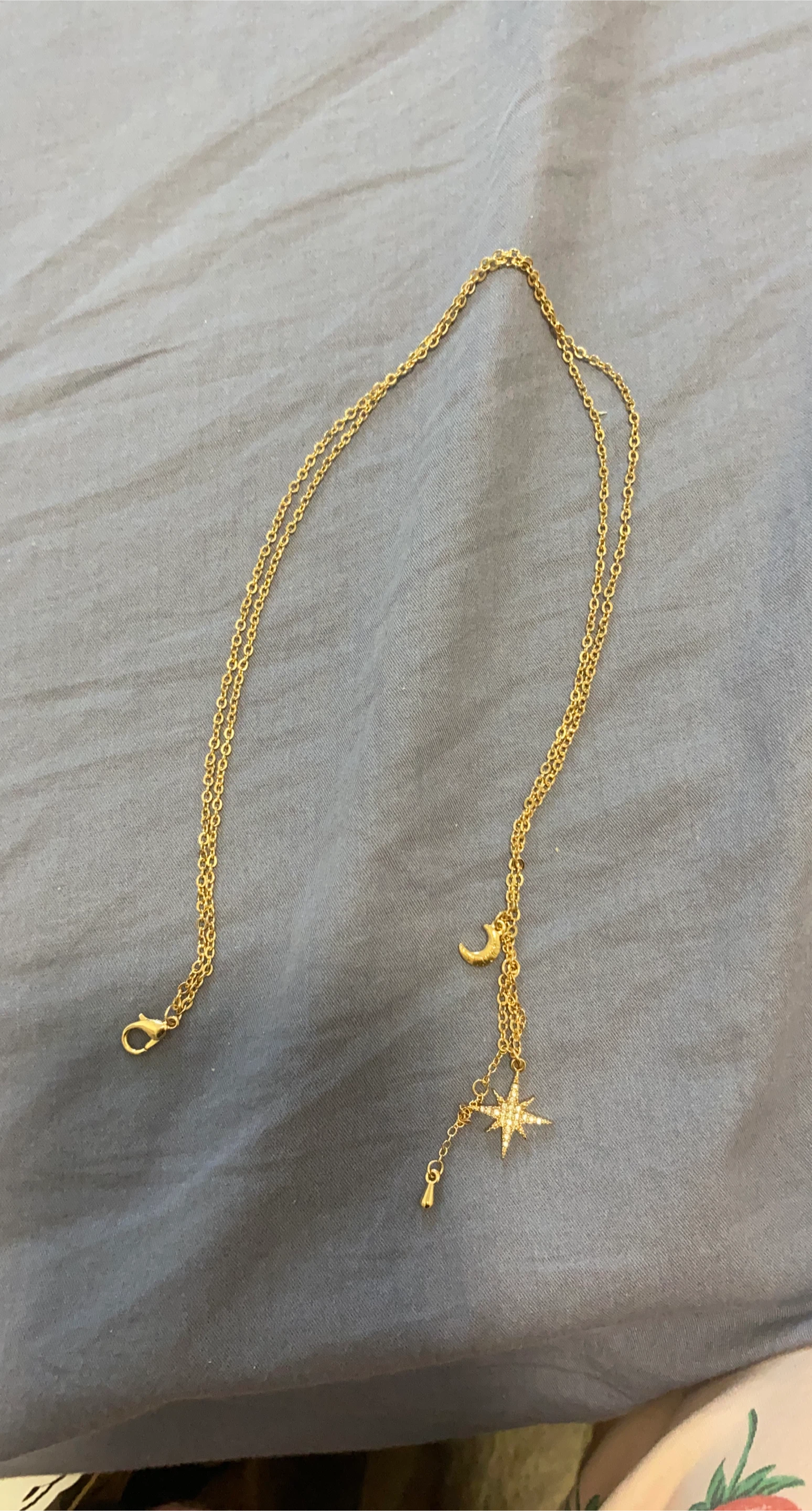 Gold-tone Star and Moon Charm Necklace