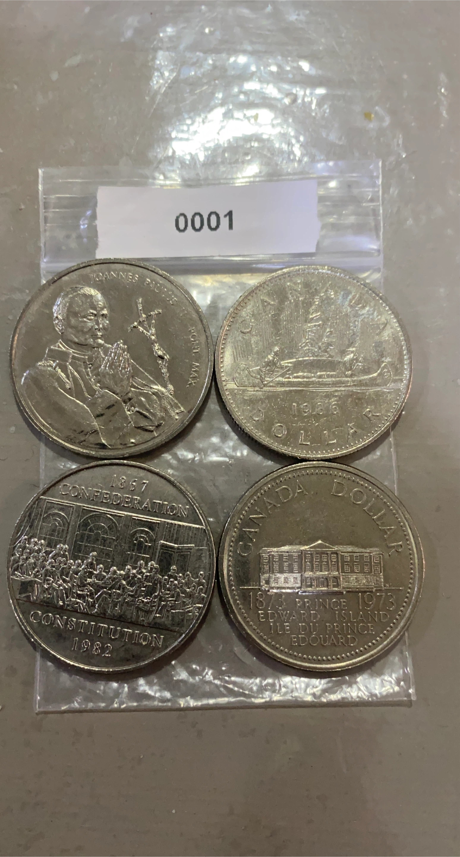 Collection of Four Canadian Dollar Coins