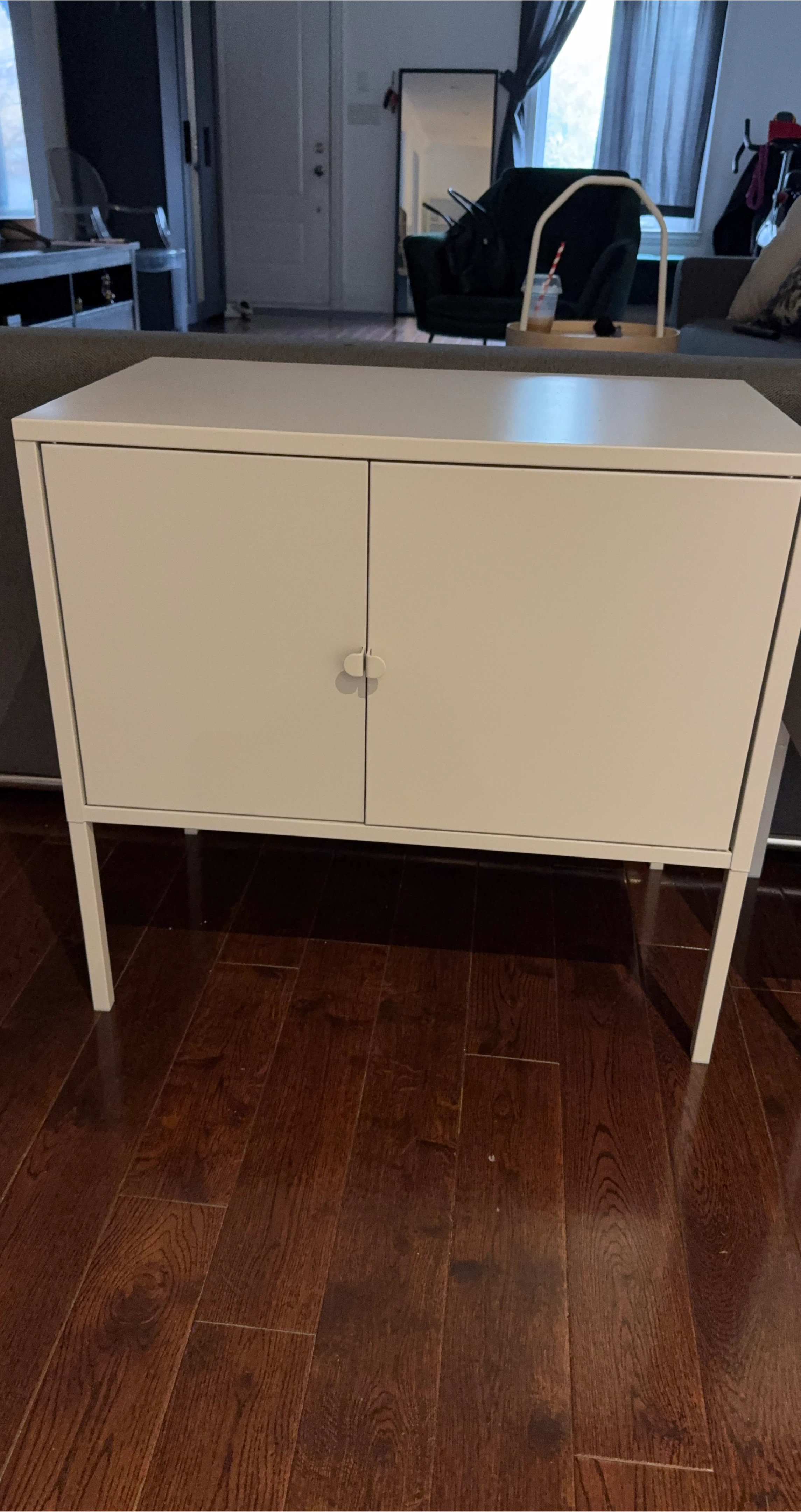 White Two-Door Cabinet with Metal Legs