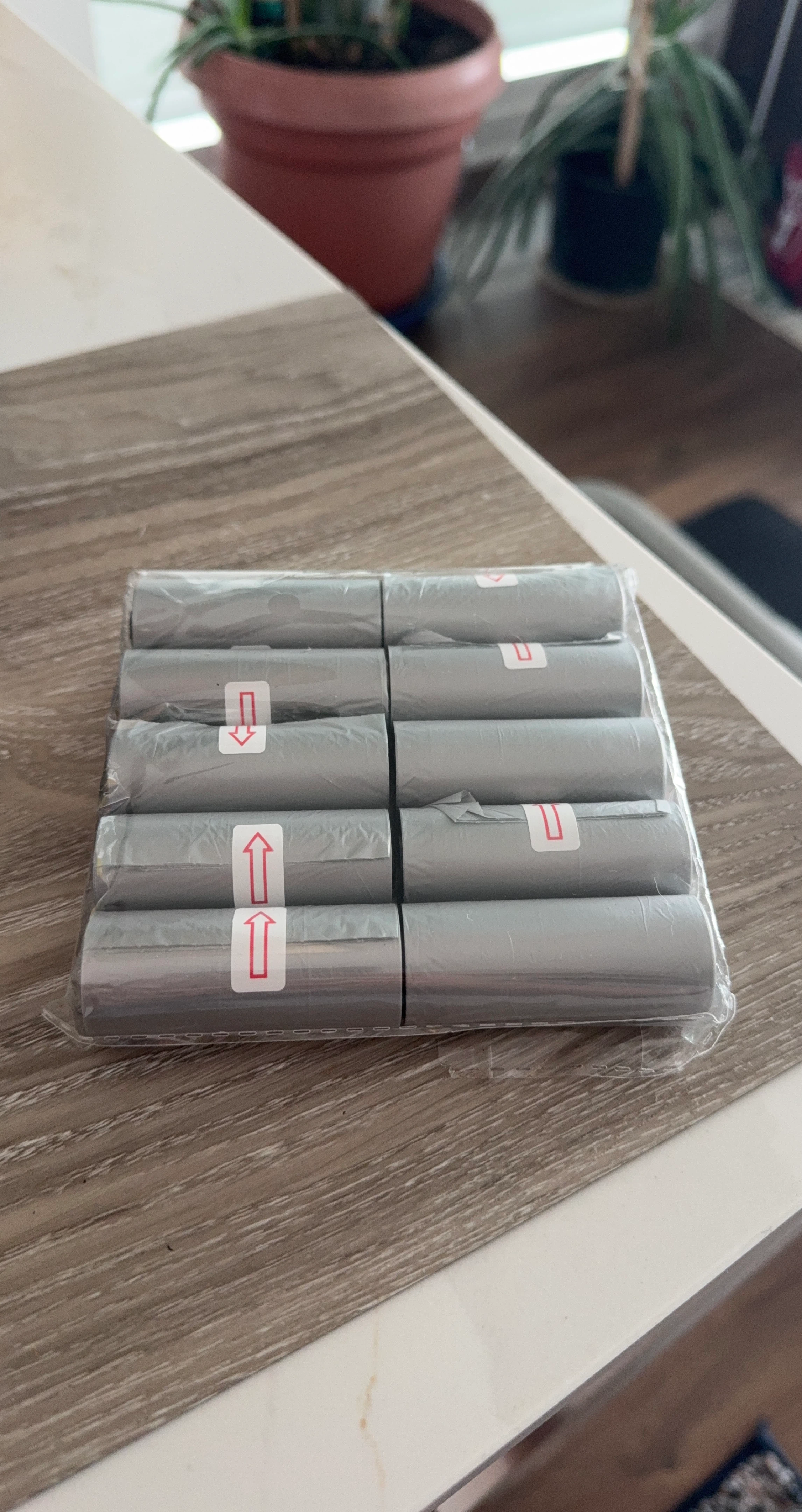 Grey dog poop bag rolls