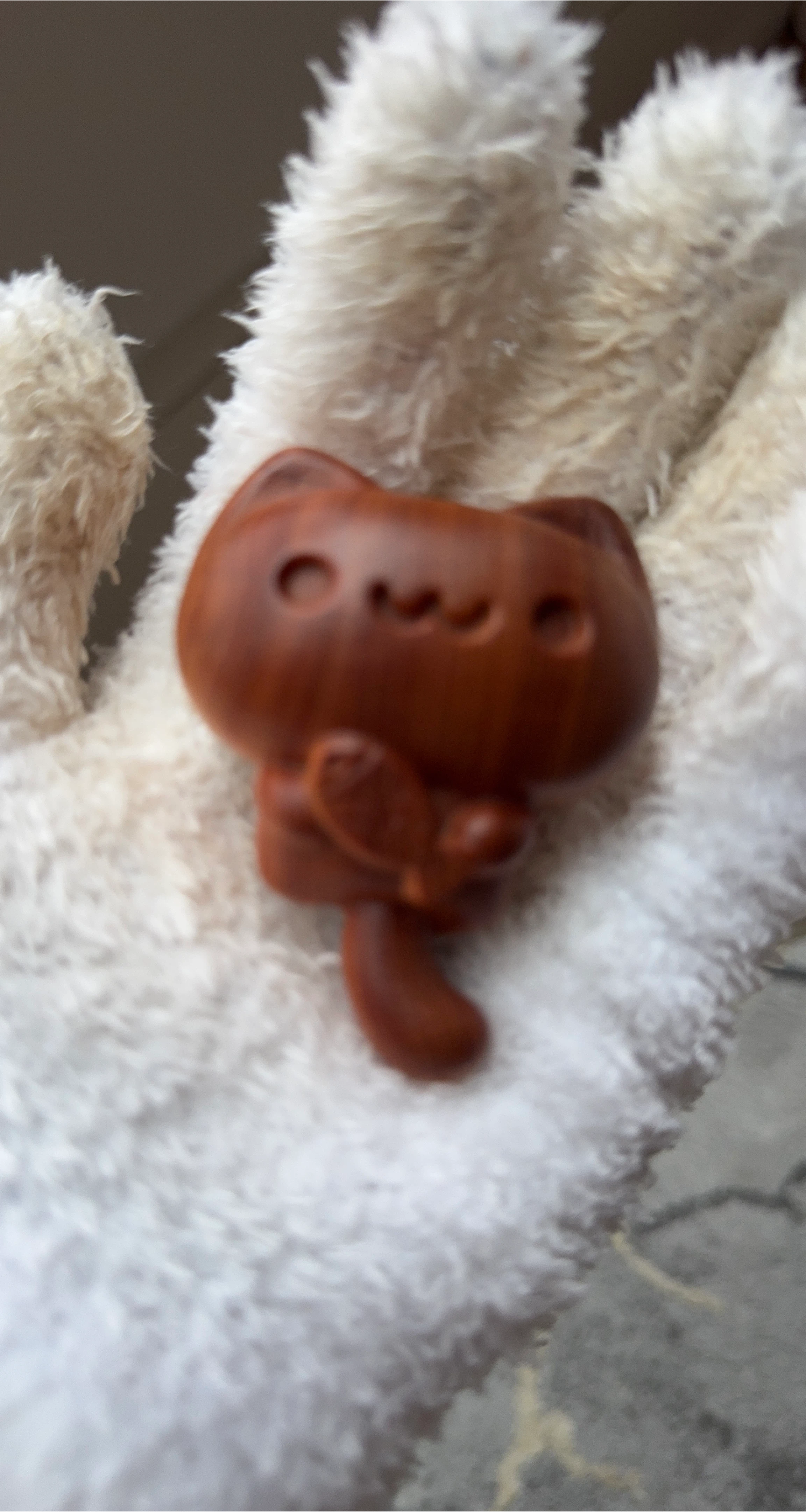 Hand-carved wooden cat figurine