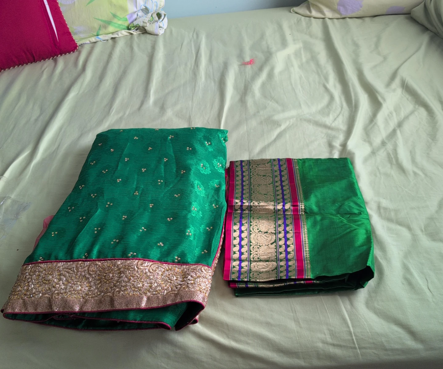 Green embroidered saree with ornate border