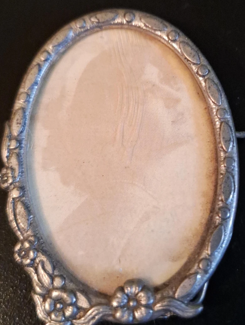 Oval Metal Photo Frame with Floral Accents