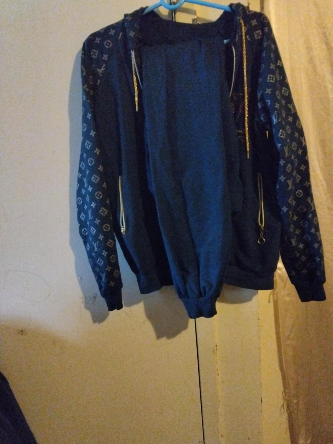 Blue Hoodie with Monogram Pattern