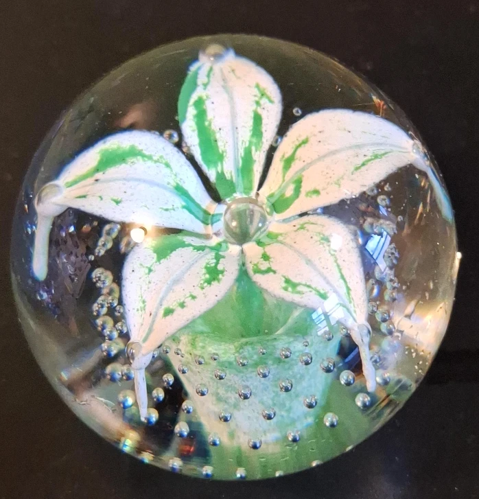 Glass Paperweight with White and Green Flower