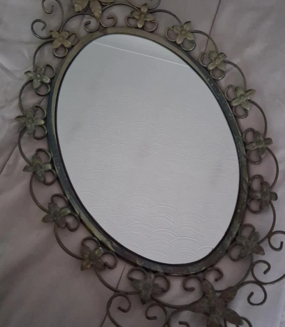Ornate Oval Wall Mirror with Floral Accents