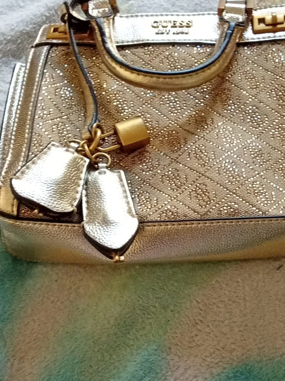 Guess Gold Glitter Satchel Handbag with Lock Charm